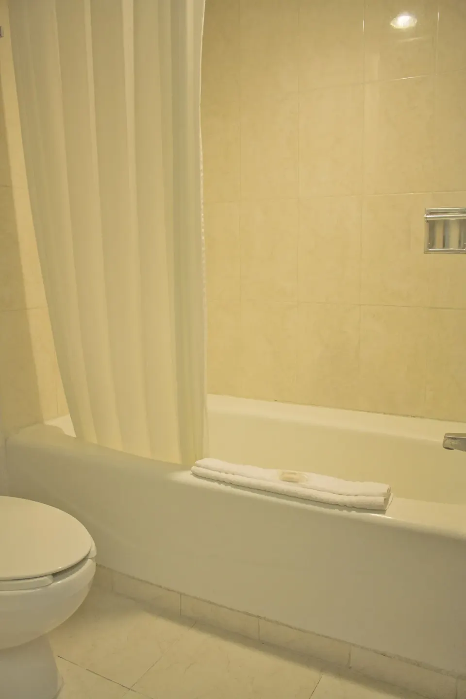 Junior Suite Sea View bathroom tub and shower at All Ritmo Cancun Resort & Water Park.