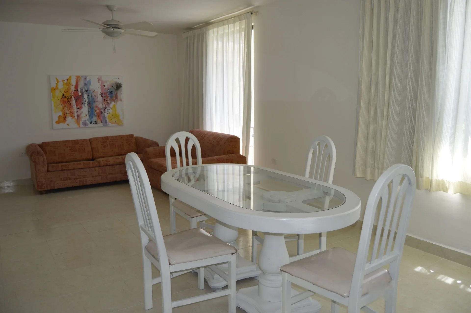 Master Suite Garden View living and dining area at All Ritmo Cancun Resort & Water Park.