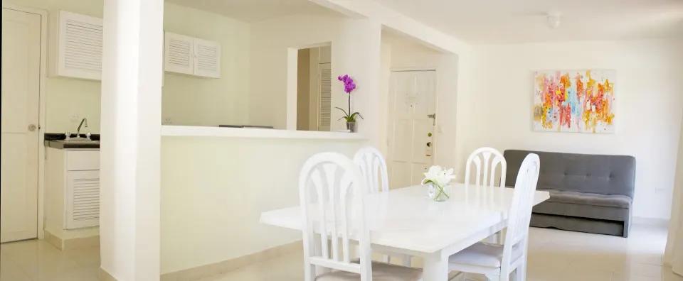 Master Suite Garden View dining area and kitchenette at All Ritmo Cancun Resort & Water Park.