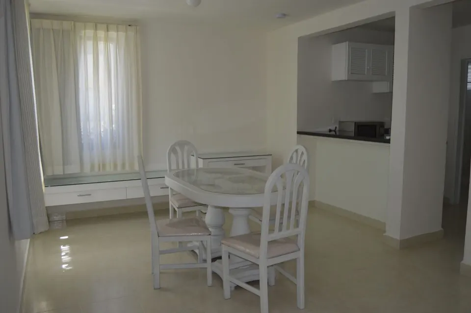 Master Suite Garden View dining area by the kitchenette at All Ritmo Cancun Resort & Water Park.