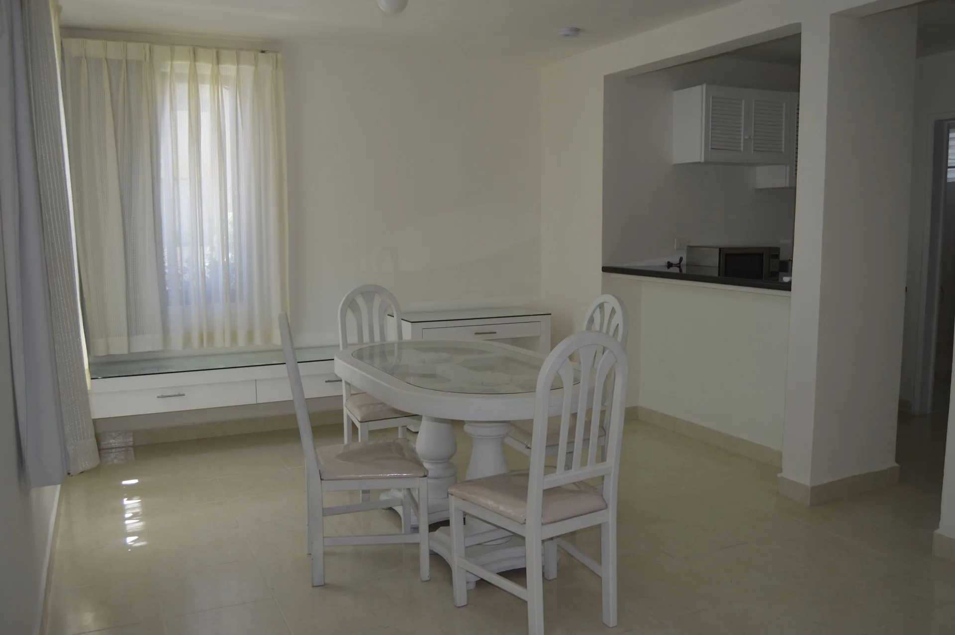 Master Suite Garden View dining area by the kitchenette at All Ritmo Cancun Resort & Water Park.