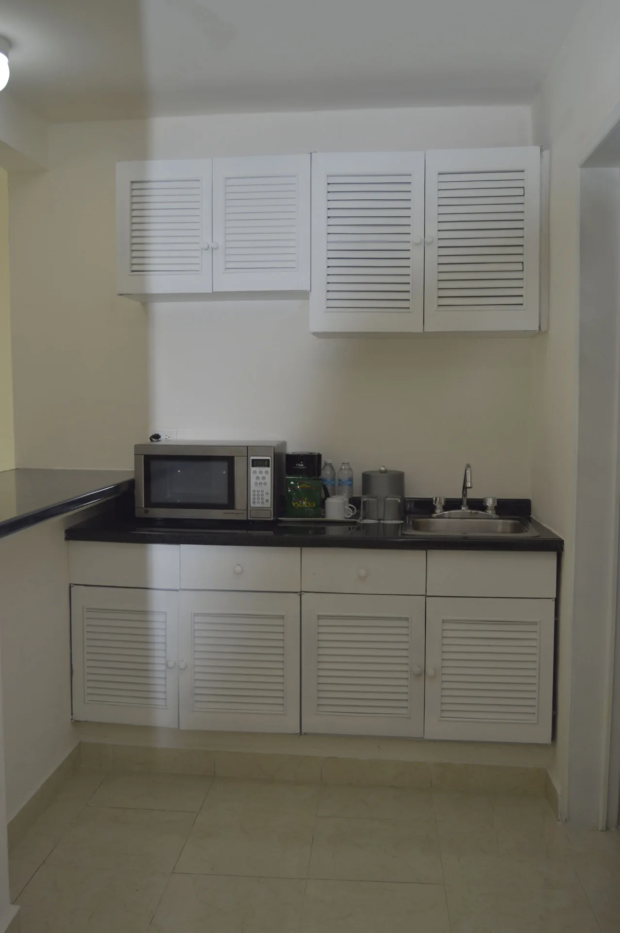 Master Suite Garden View kitchenette at All Ritmo Cancun Resort & Water Park.