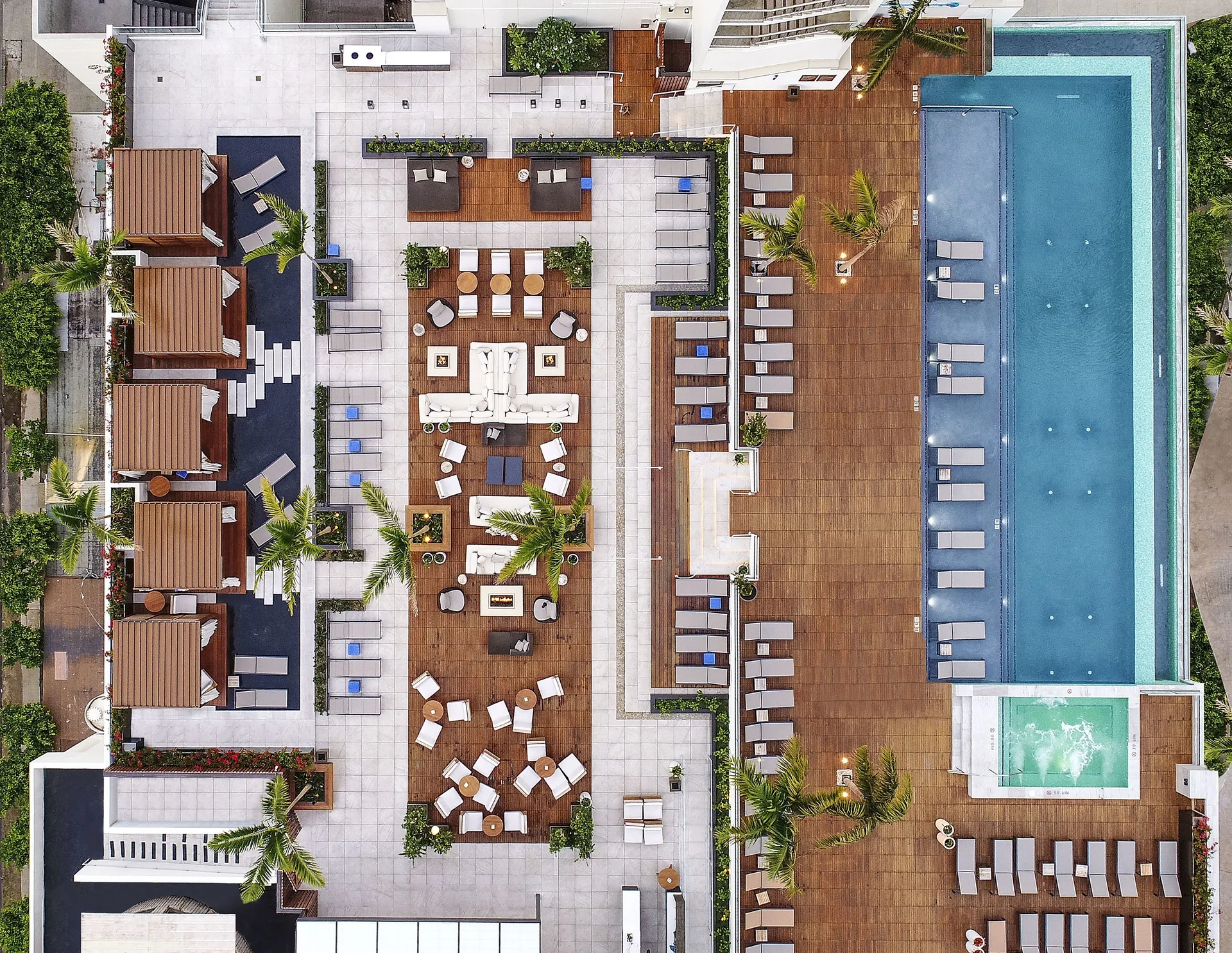 Aerial view of the pool deck and lounge areas at 'Alohilani Resort Waikiki Beach.