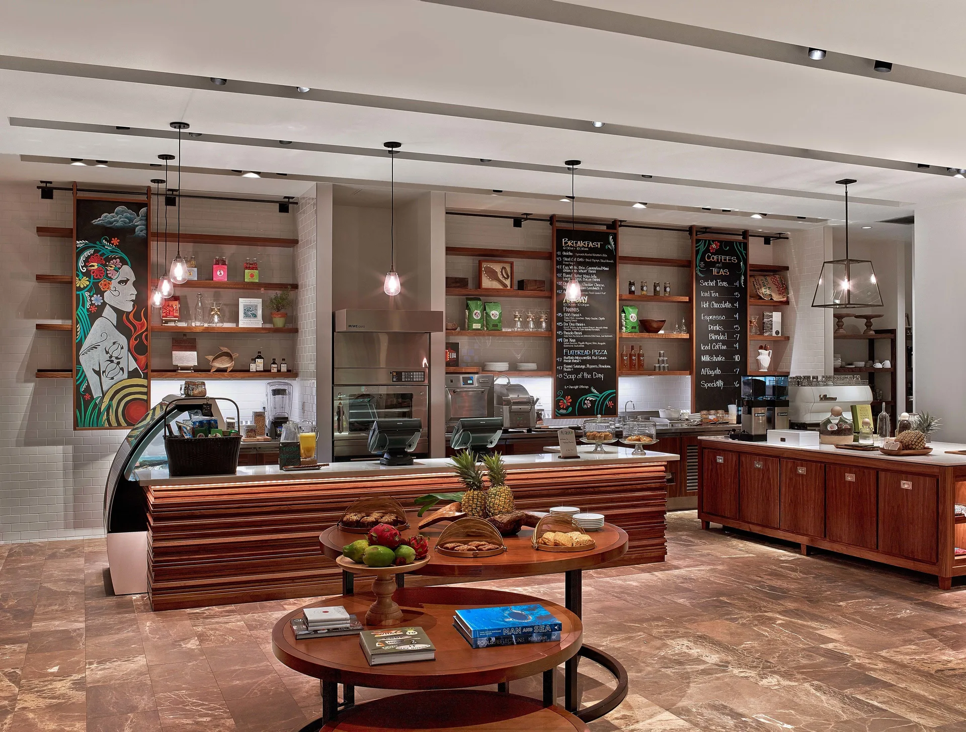 Mokapu Market counter with menus and pastries at Andaz Maui at Wailea Resort.