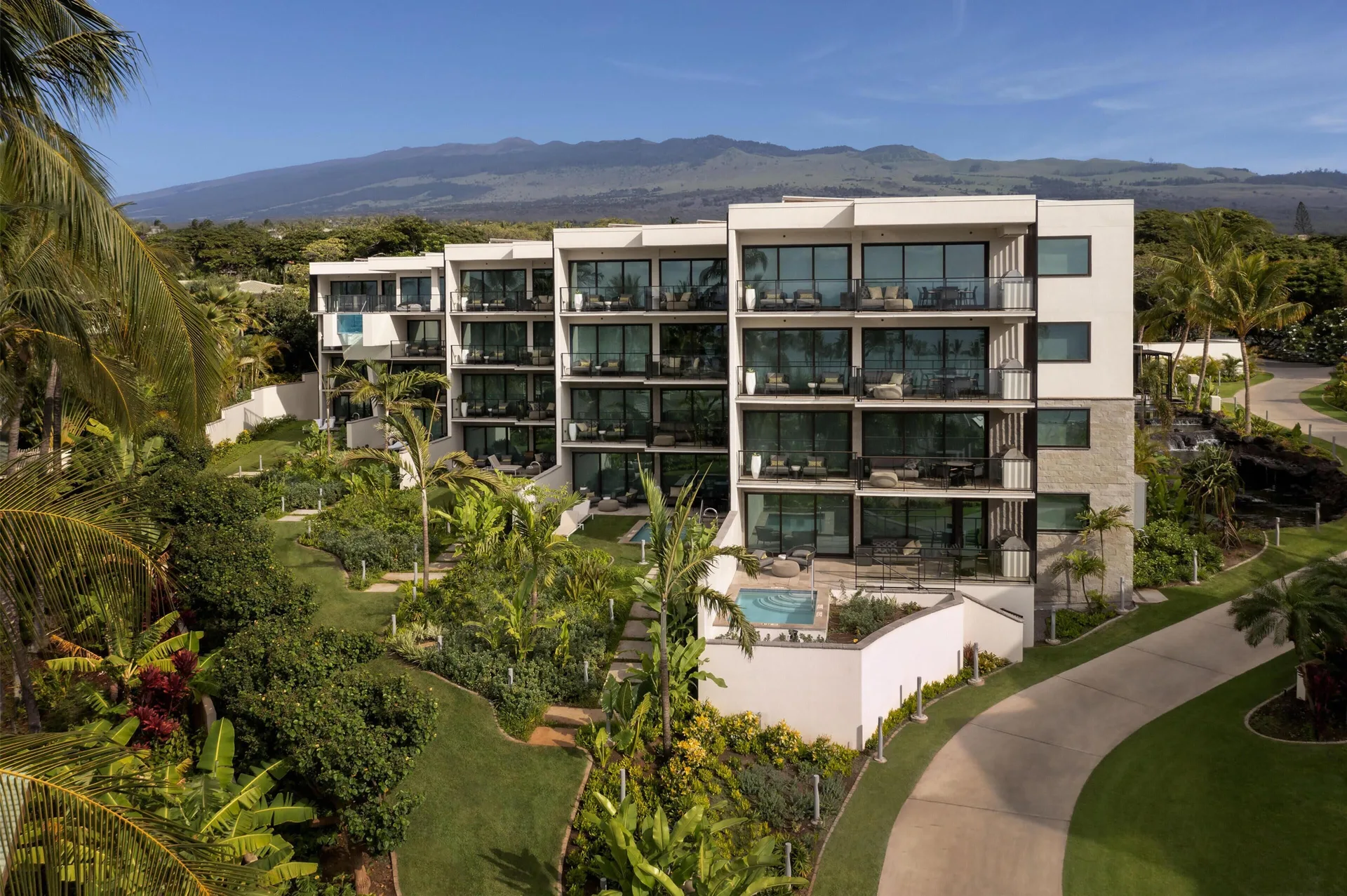 Villa building and tropical landscaping at Andaz Maui at Wailea Resort.