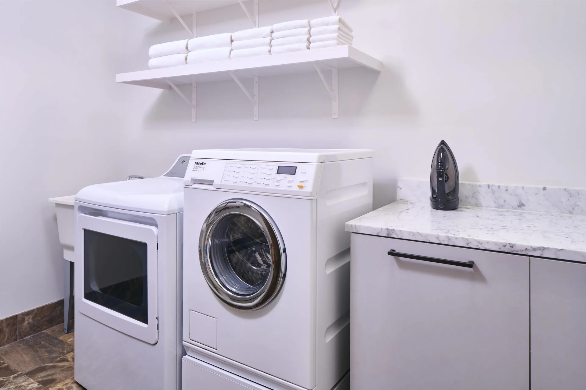 Laundry room in the 3 Bedroom Ilikai Villa at Andaz Maui at Wailea Resort.