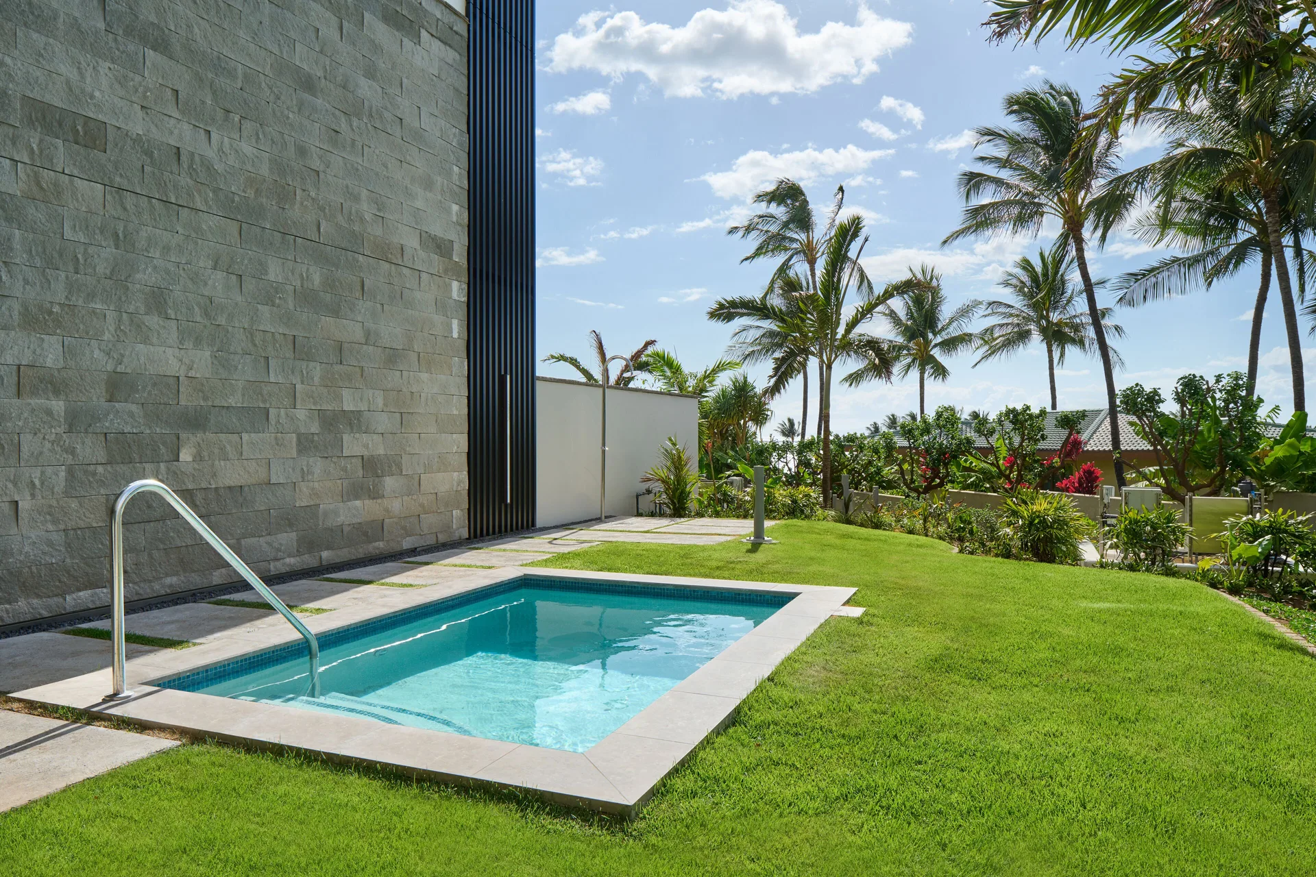 Private plunge pool and garden lawn at the 3 Bedroom Ilikai Villa at Andaz Maui at Wailea Resort.