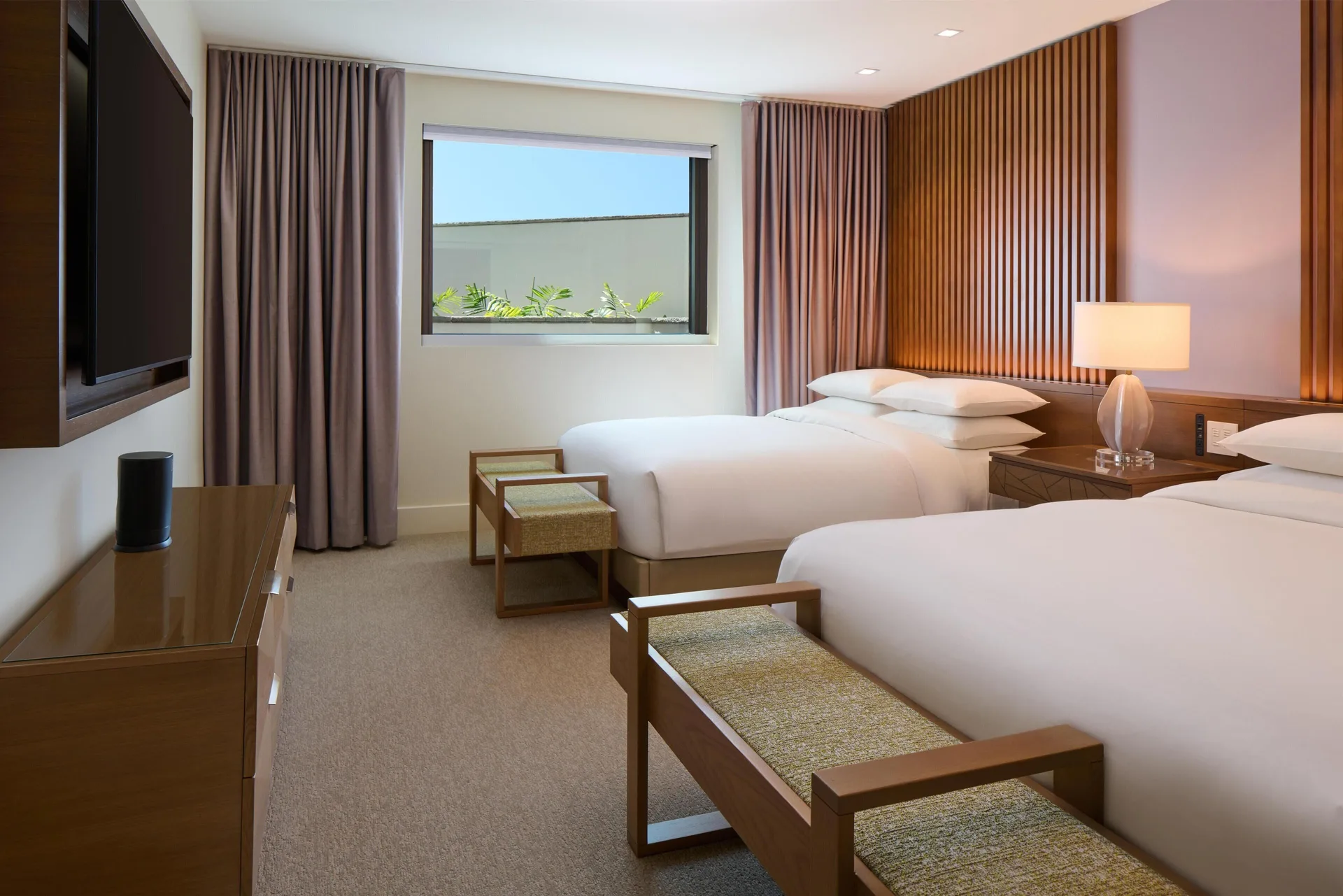 Bedroom with two queen beds in the Ilikai Villa at Andaz Maui at Wailea Resort.