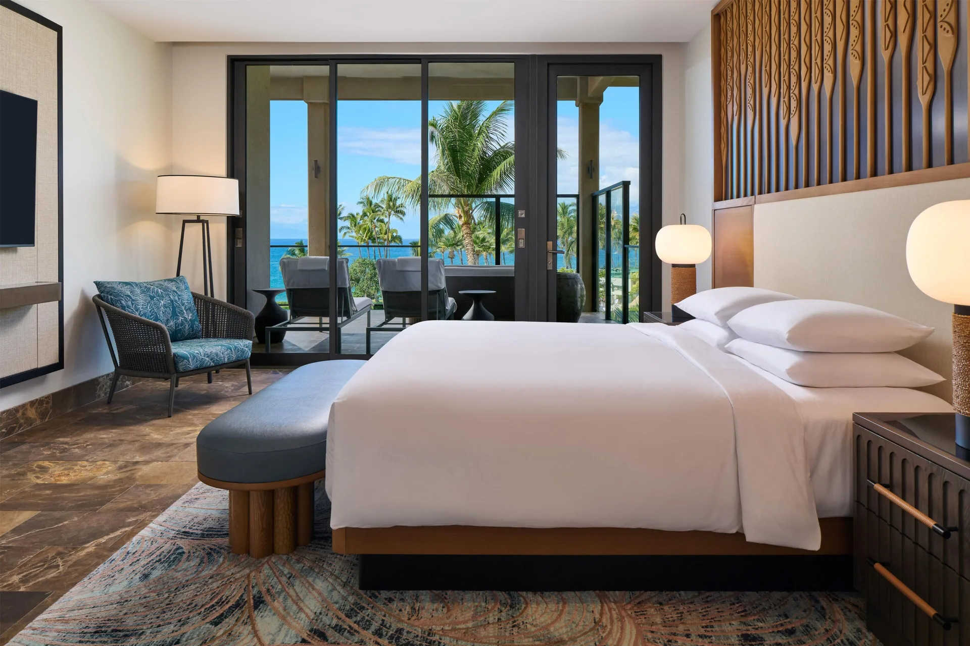 Ocean-view villa bedroom with king bed and balcony at Andaz Maui at Wailea Resort.