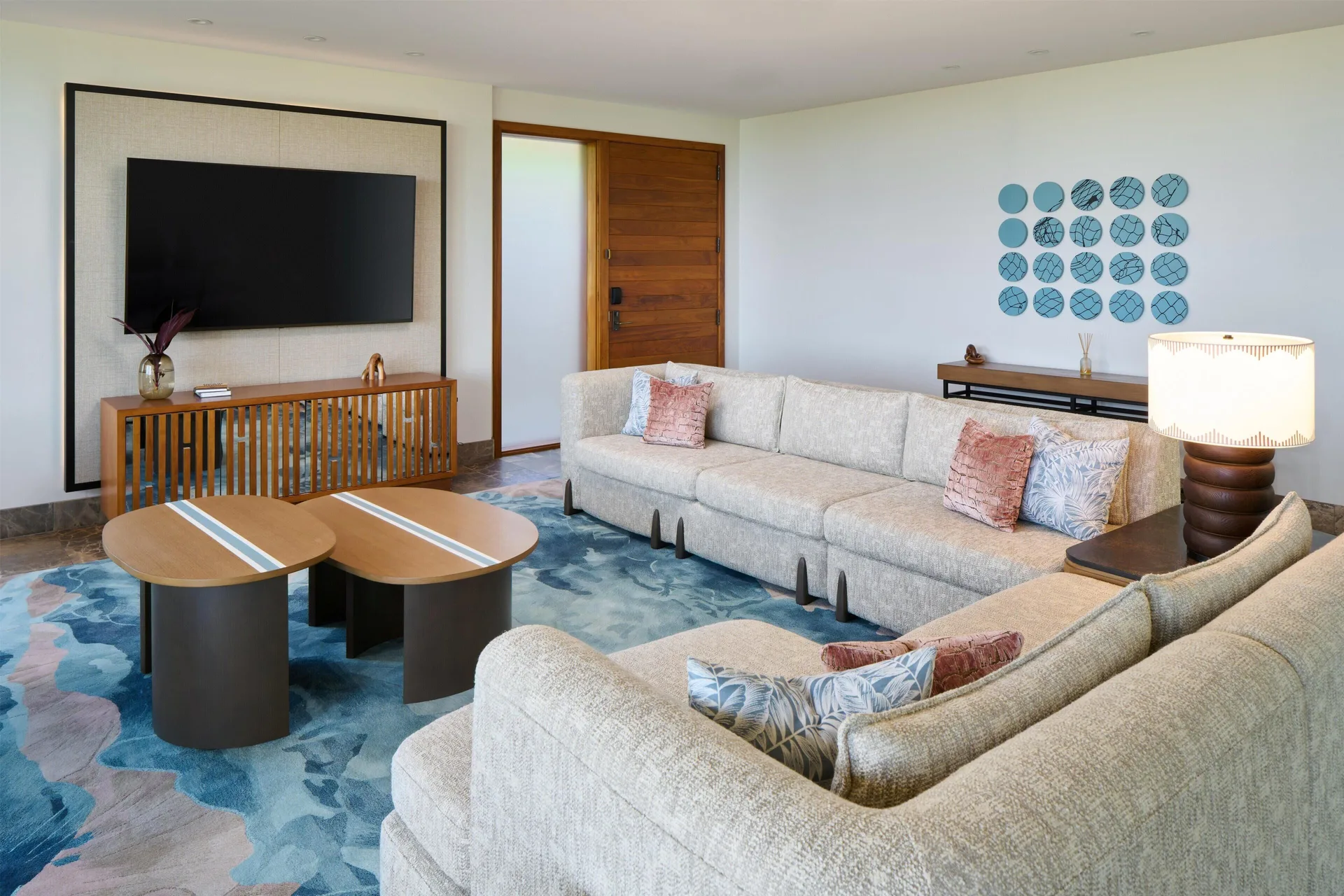 Oceanfront villa living room with sectional sofas at Andaz Maui at Wailea Resort.