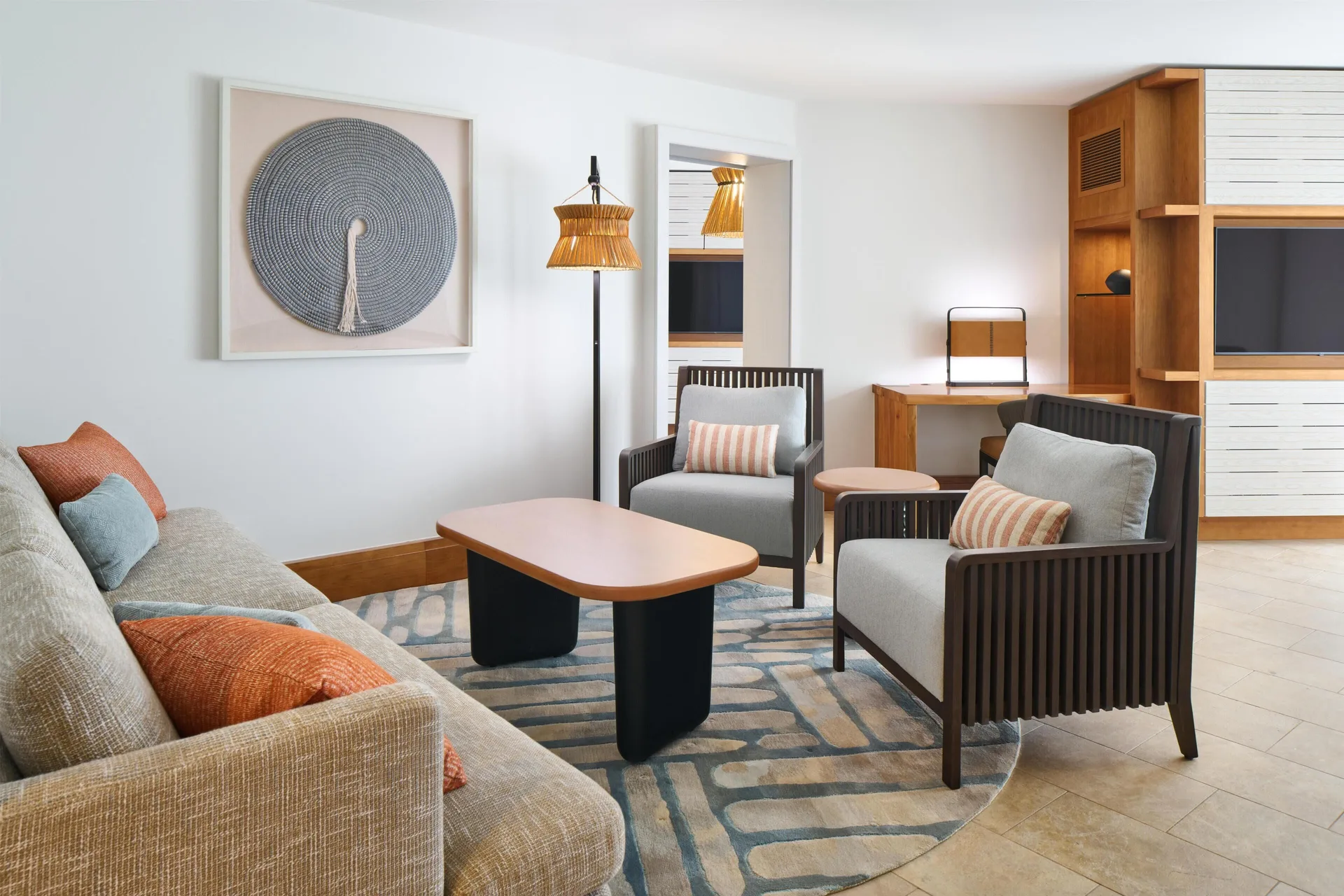 Ocean View Suite living room with sofa and armchairs at Andaz Maui at Wailea Resort.
