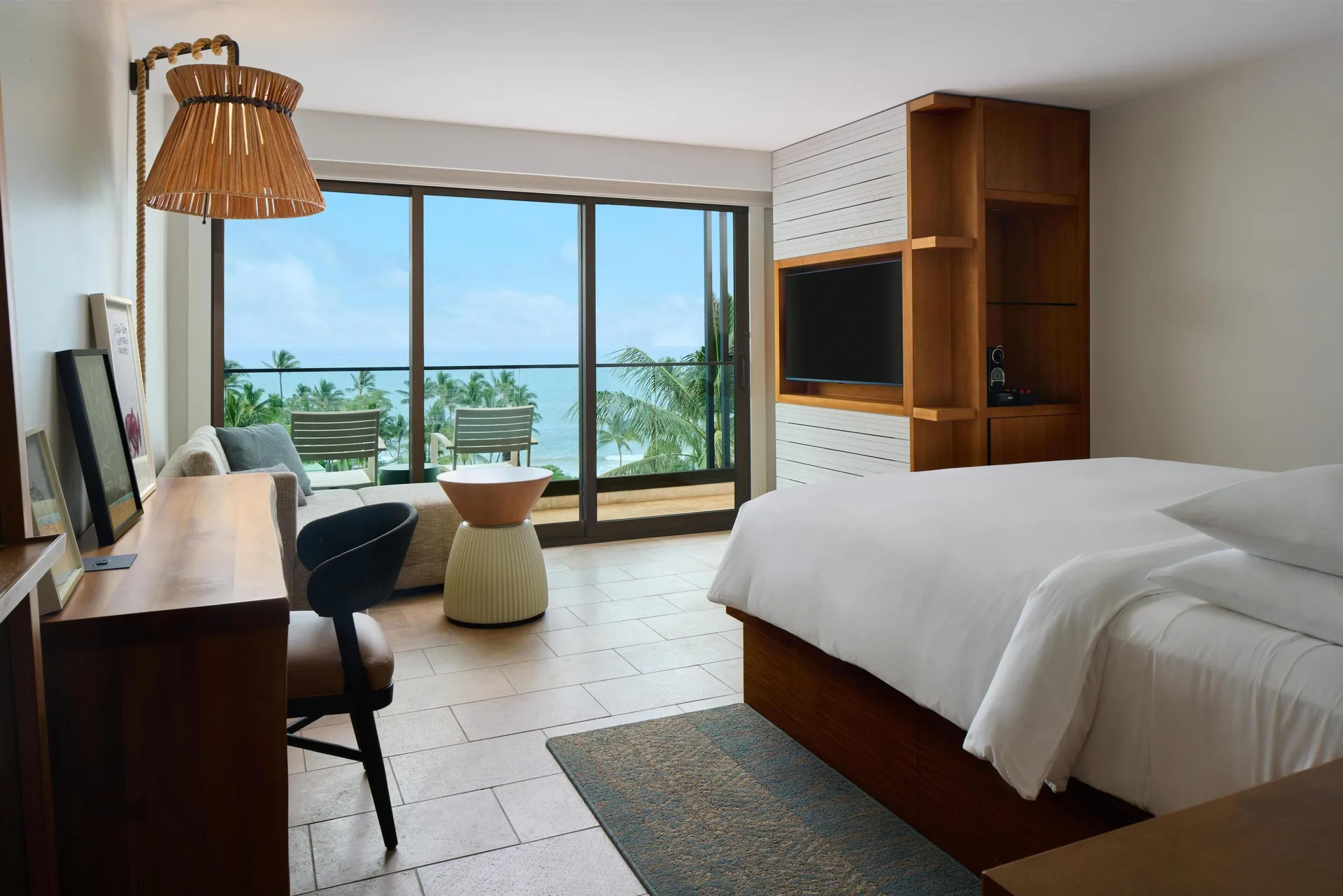 King bed ocean view room with desk, balcony chairs, and sea view at Andaz Maui at Wailea Resort.