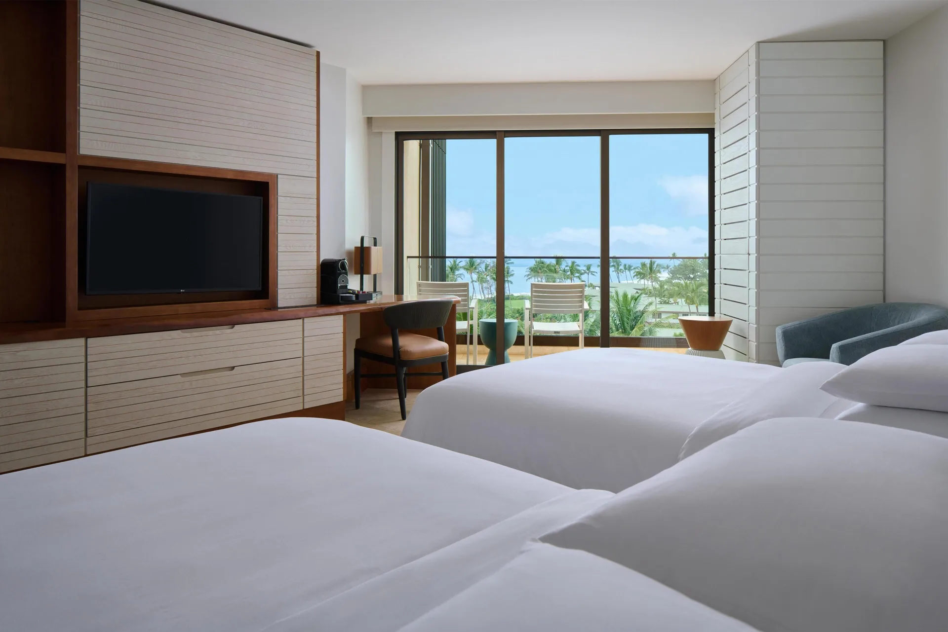 Two-bed ocean view room with TV wall and balcony at Andaz Maui at Wailea Resort.
