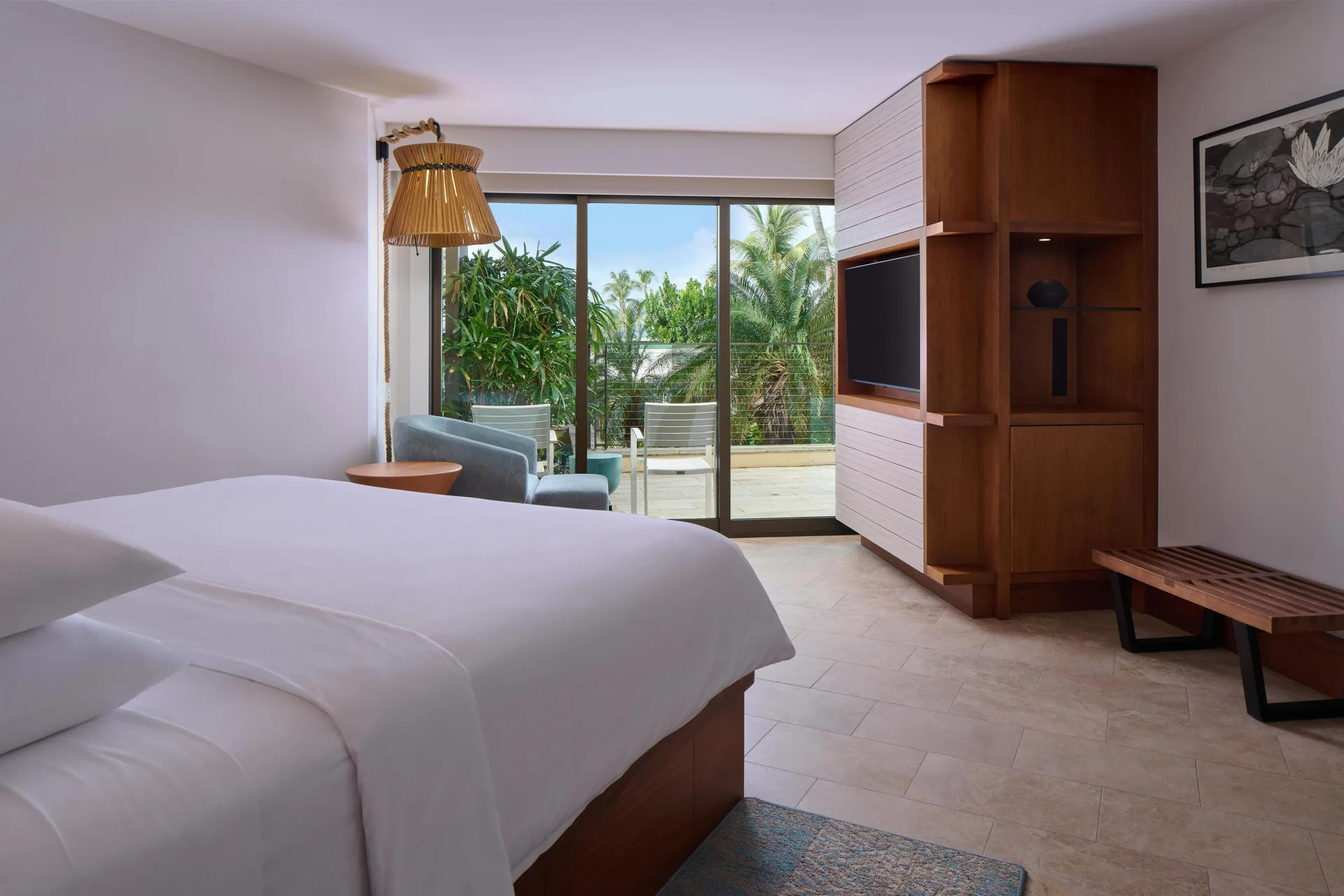 Partial View Suite king bedroom with lanai doors at Andaz Maui at Wailea Resort.