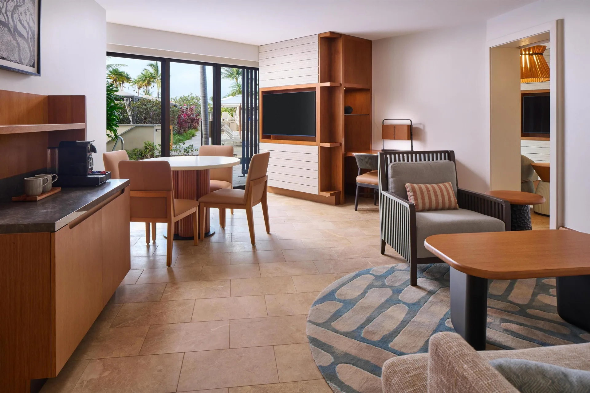 Pool Side Suite lounge and dining room with kitchenette at Andaz Maui at Wailea Resort.