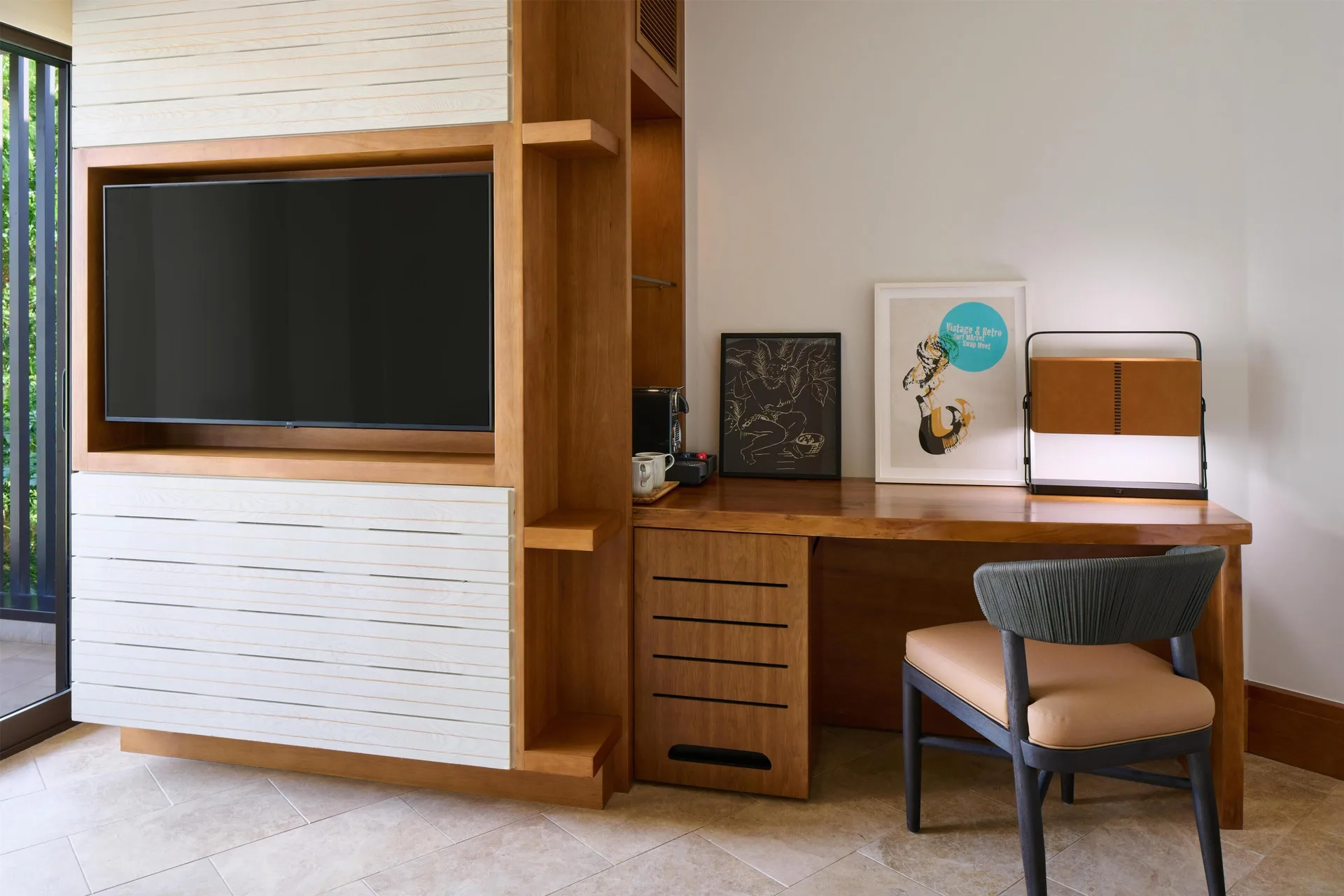 TV, desk, chair, and coffee setup in a resort view room at Andaz Maui at Wailea Resort.