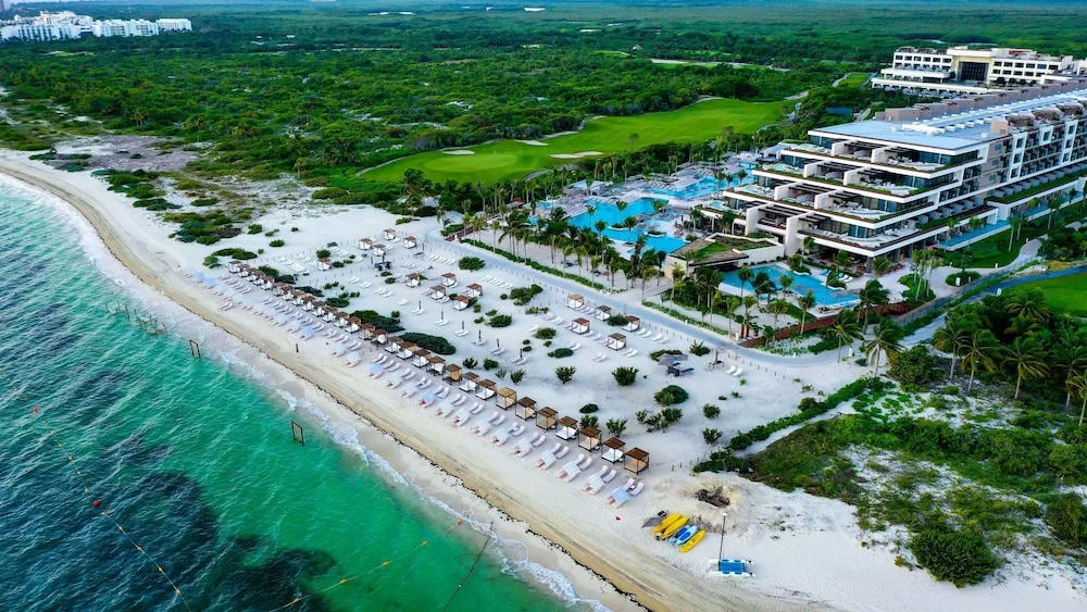 Atelier Playa Mujeres adults-only luxury all-inclusive resort with beachfront pools and modern Mexican architecture in Playa Mujeres.