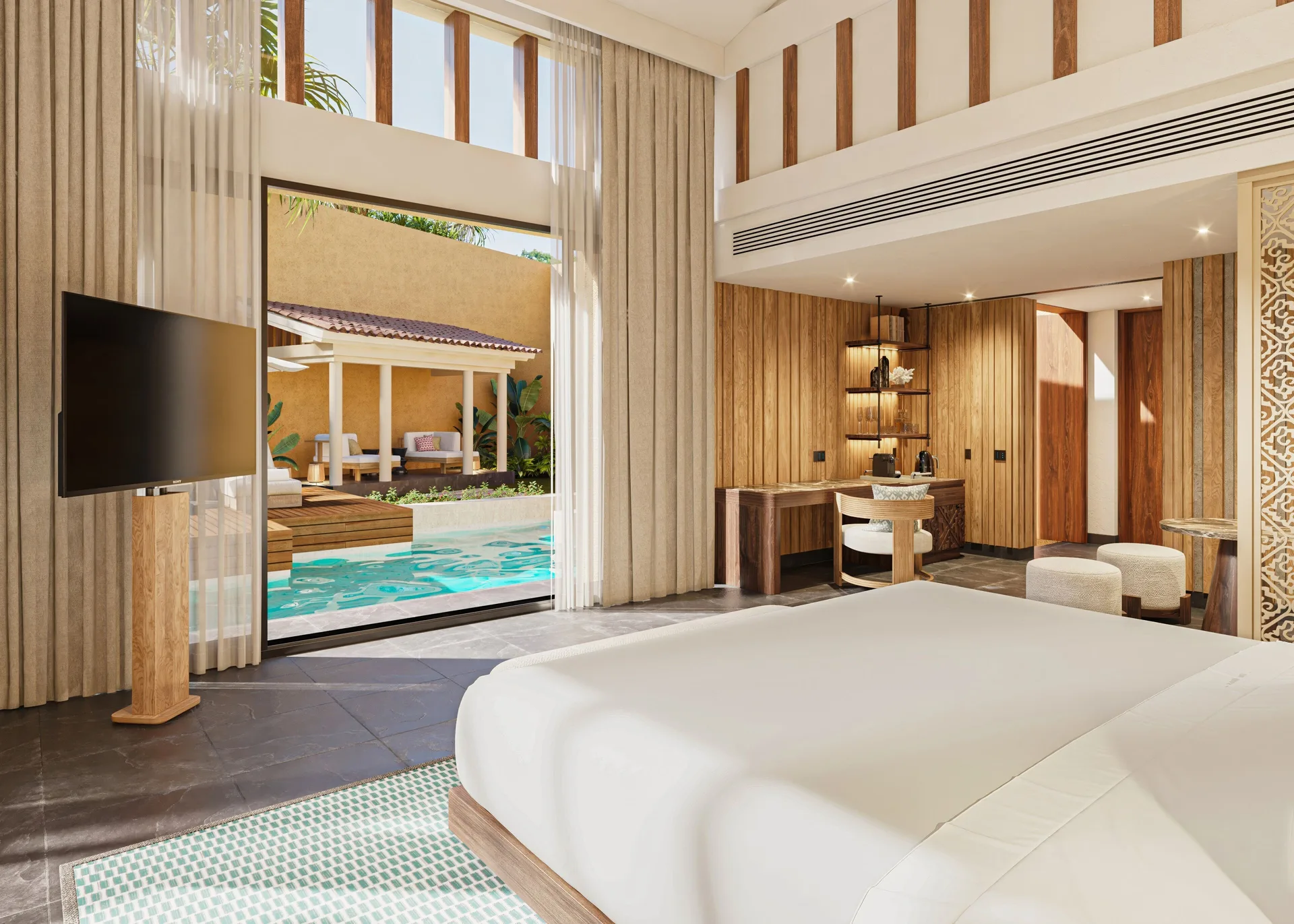 Bliss Pool Villa king bed facing the private pool terrace at Banyan Tree Mayakoba.