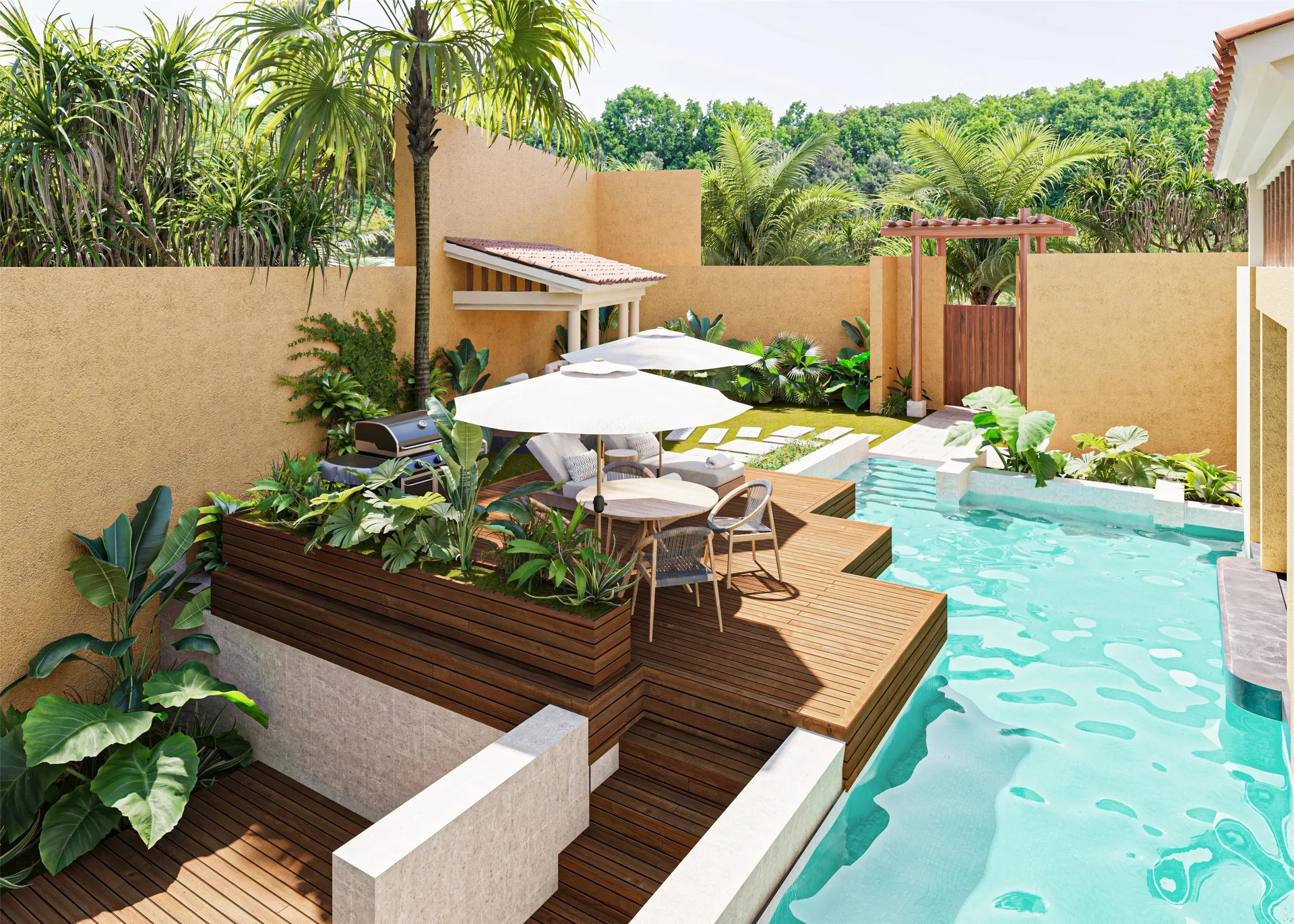 Bliss Pool Villa private pool courtyard with deck and umbrellas at Banyan Tree Mayakoba.