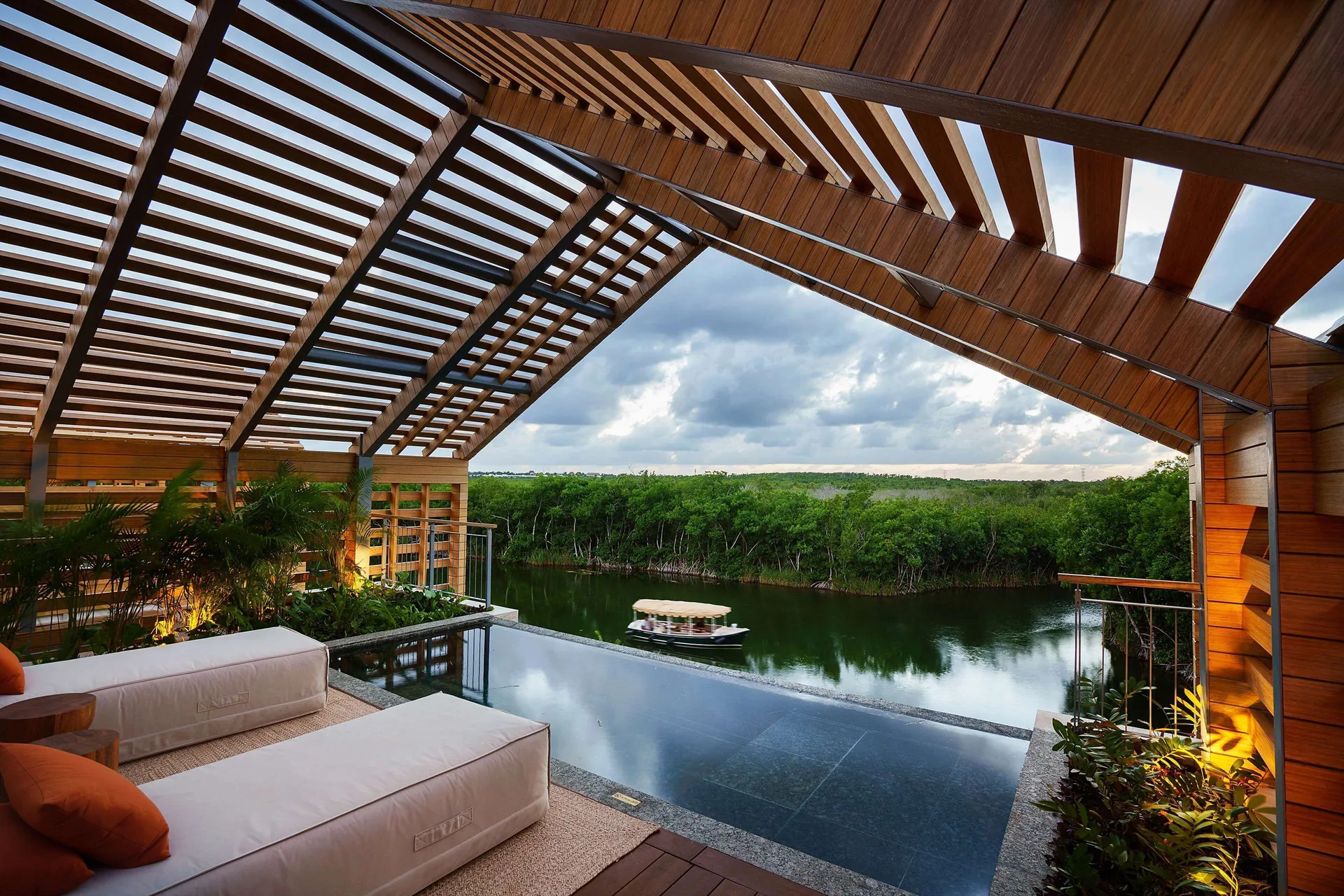 Lagoon & Sunset Rooftop Pool Villa pool facing the lagoon at Banyan Tree Mayakoba.