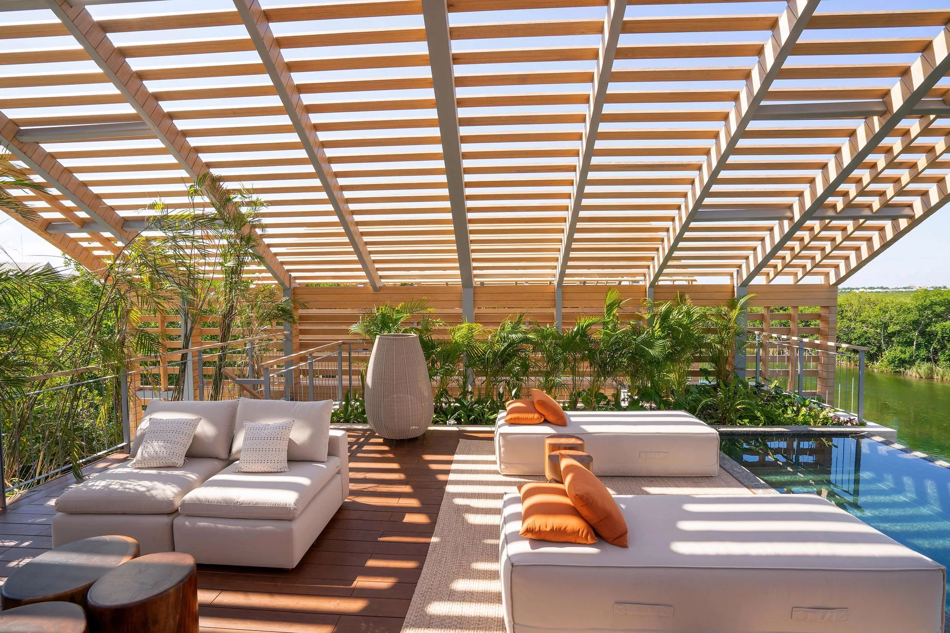 Lagoon & Sunset Rooftop Pool Villa terrace with loungers and pool at Banyan Tree Mayakoba.