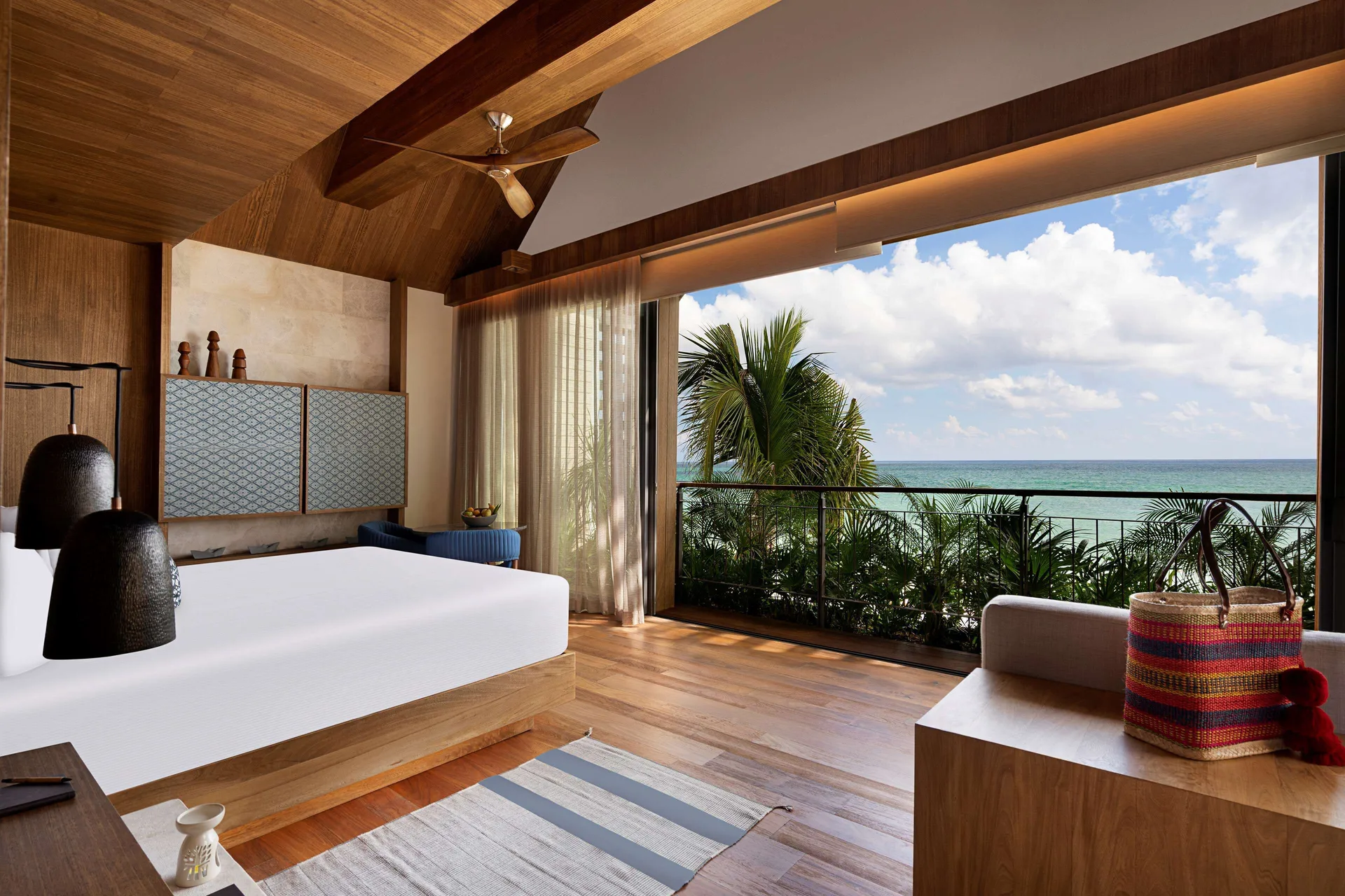 Oceanfront Balcony Pool Suite king bedroom with balcony ocean view at Banyan Tree Mayakoba.