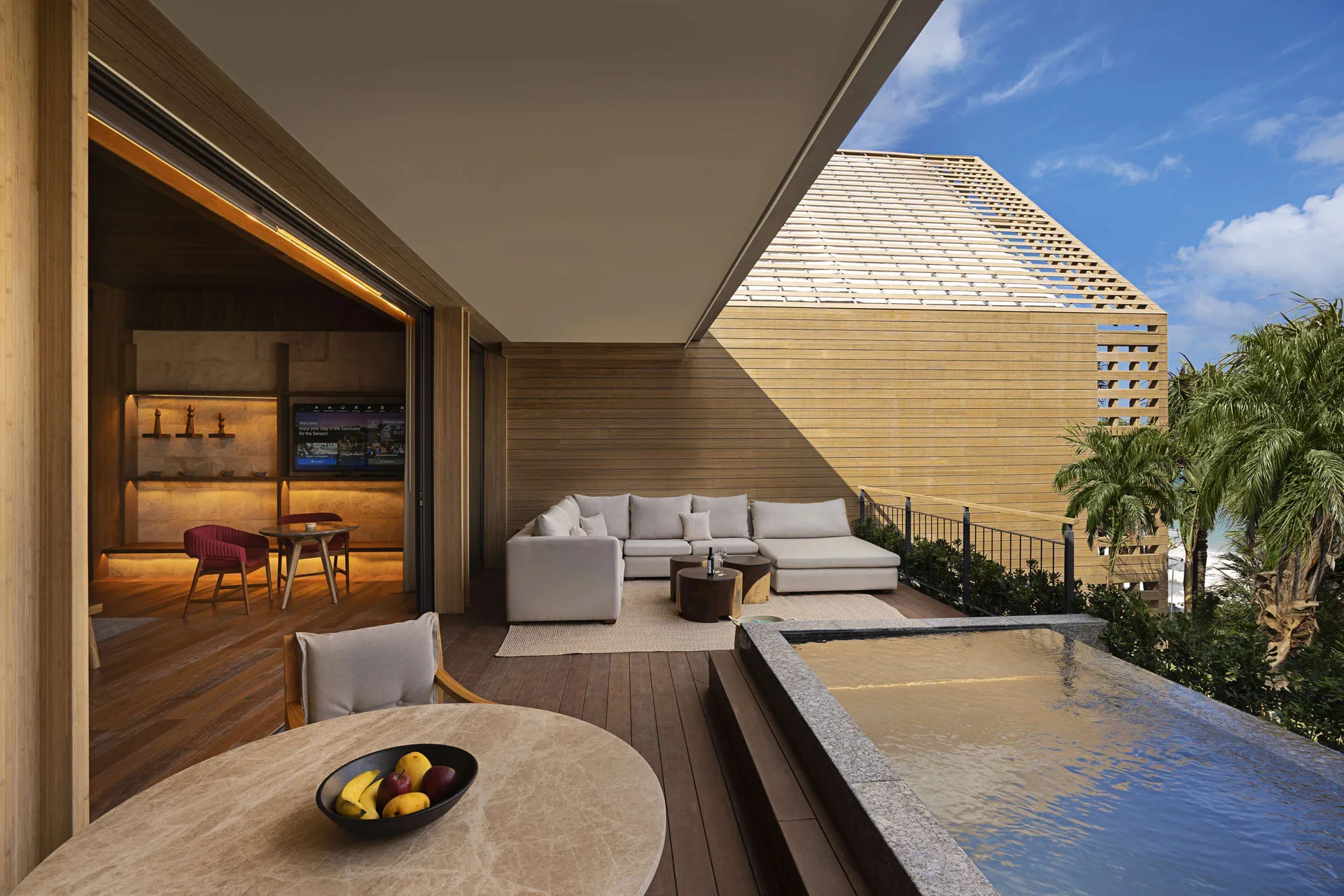 Oceanfront Veranda Pool Suite terrace with plunge pool and lounge seating at Banyan Tree Mayakoba.