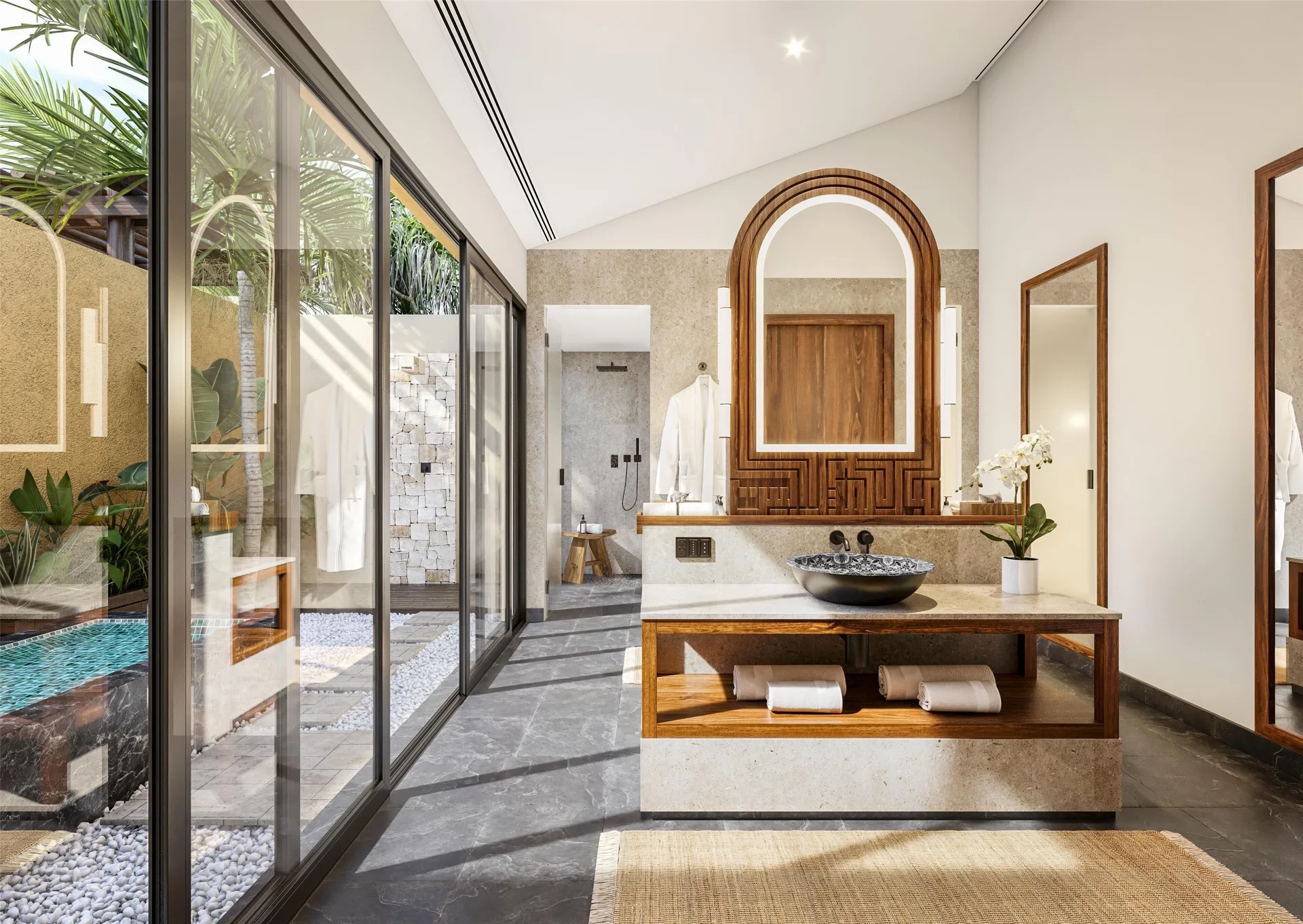 Serenity Pool Villa bathroom vanity and outdoor shower at Banyan Tree Mayakoba.