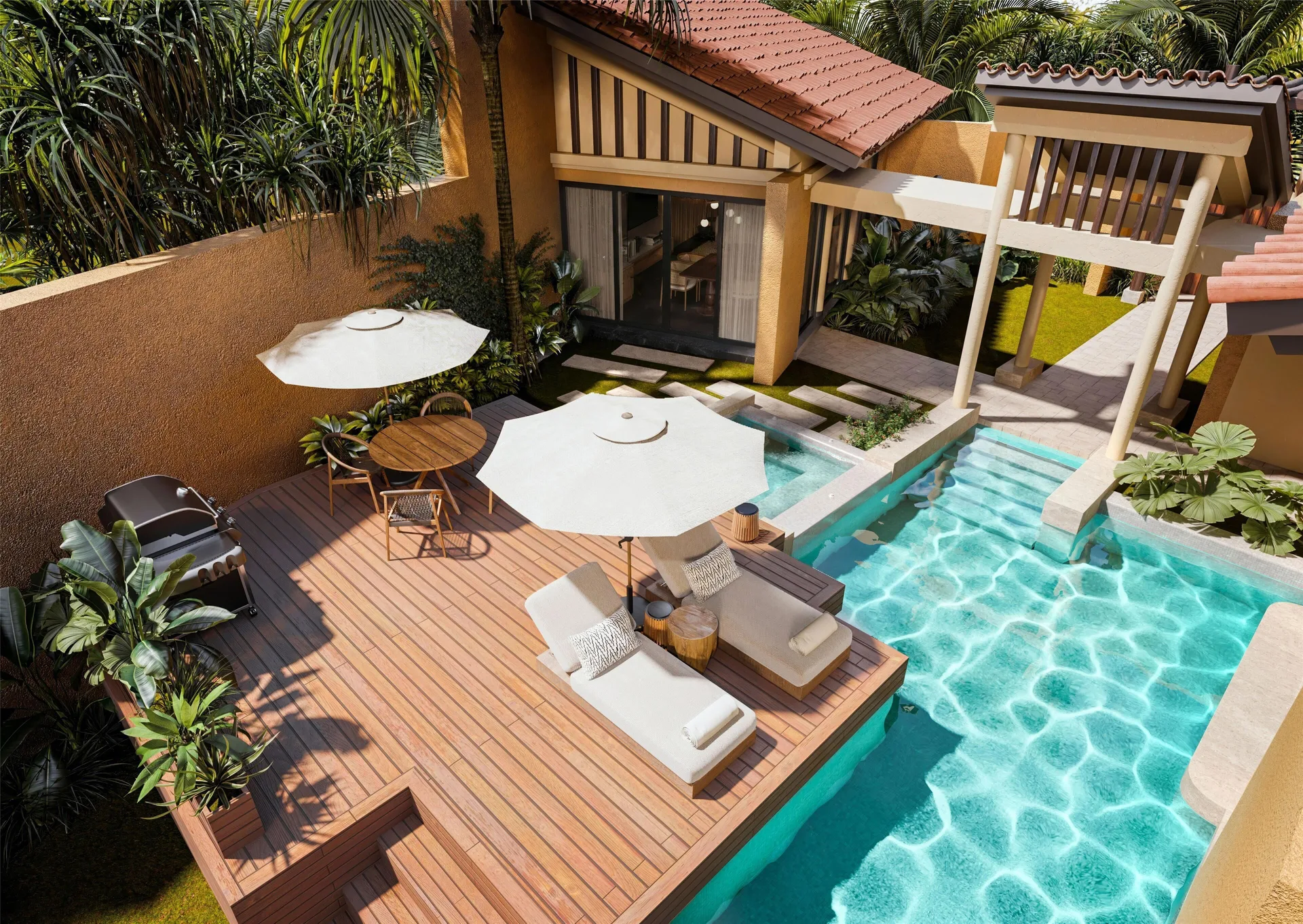Serenity Pool Villa deck with pool and loungers at Banyan Tree Mayakoba.