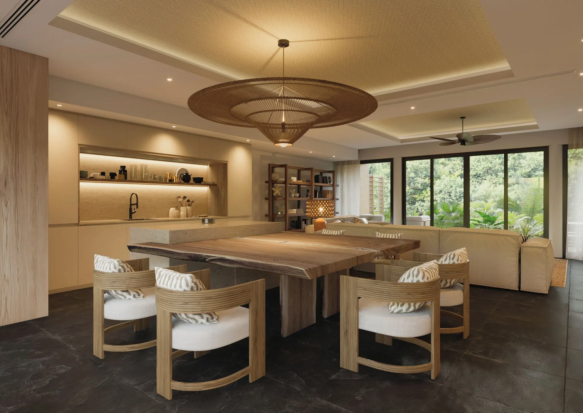 Three-Bedroom Family Residence dining table and kitchen at Banyan Tree Mayakoba.