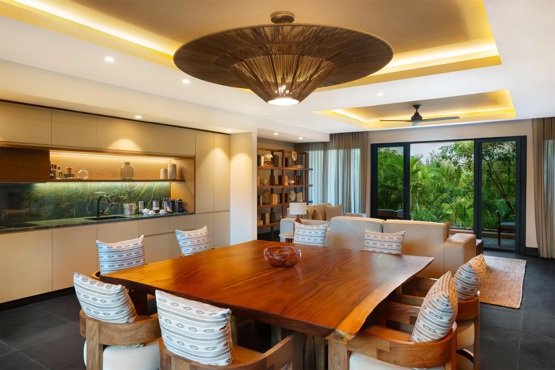 Three-Bedroom Family Residence dining and living area at Banyan Tree Mayakoba.
