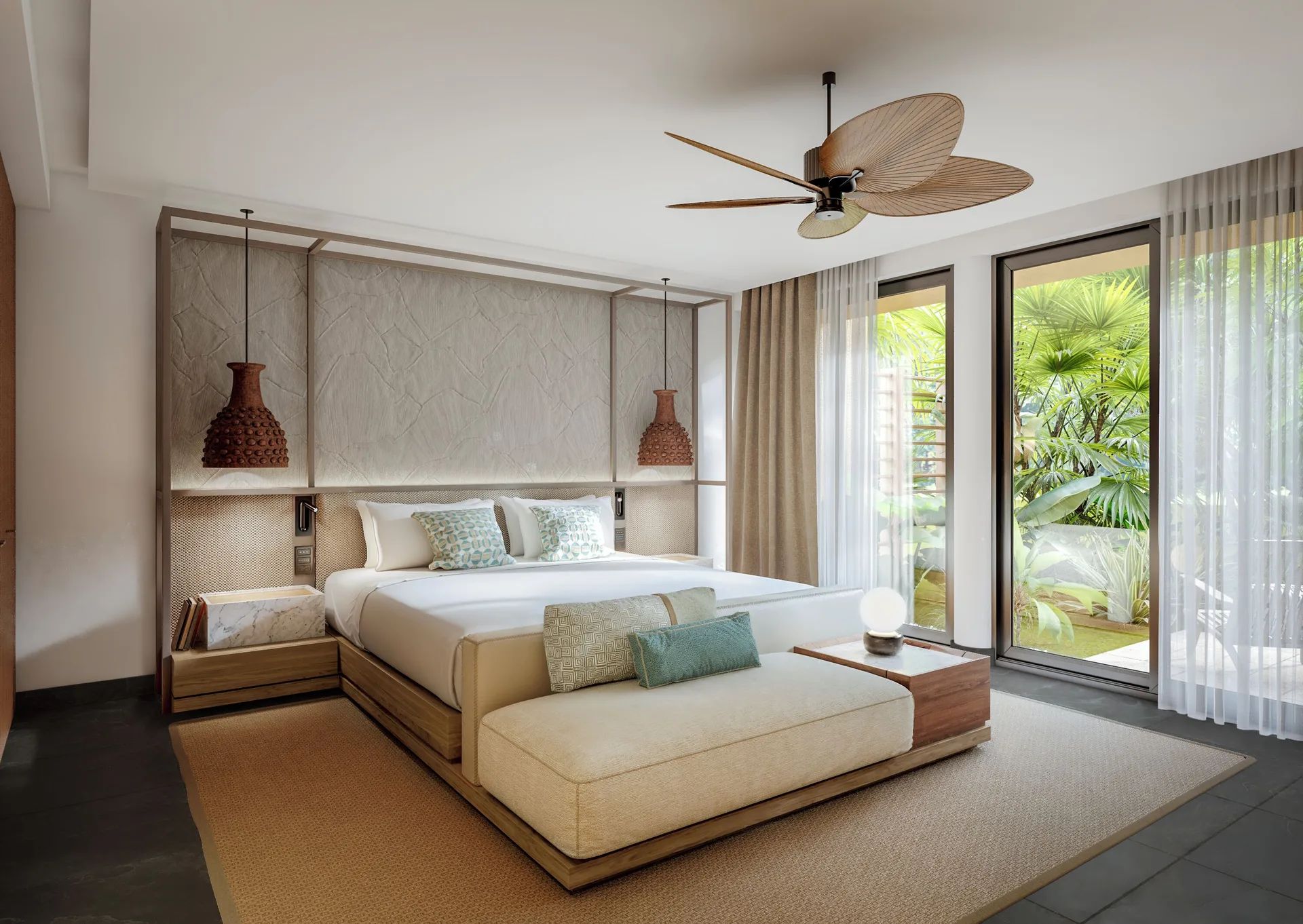 Three-Bedroom Family Residence king bed beside garden windows at Banyan Tree Mayakoba.