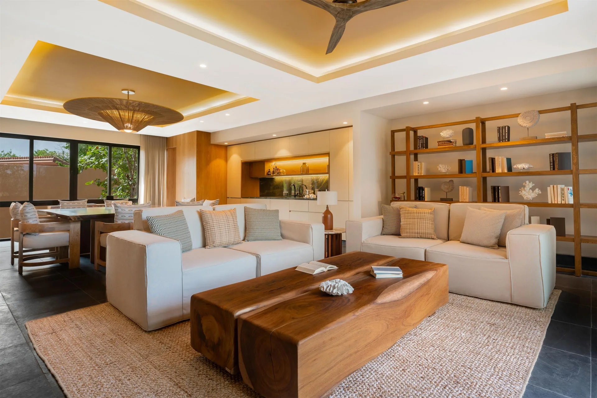 Living and dining area in a Three-Bedroom Family Residence at Banyan Tree Mayakoba.