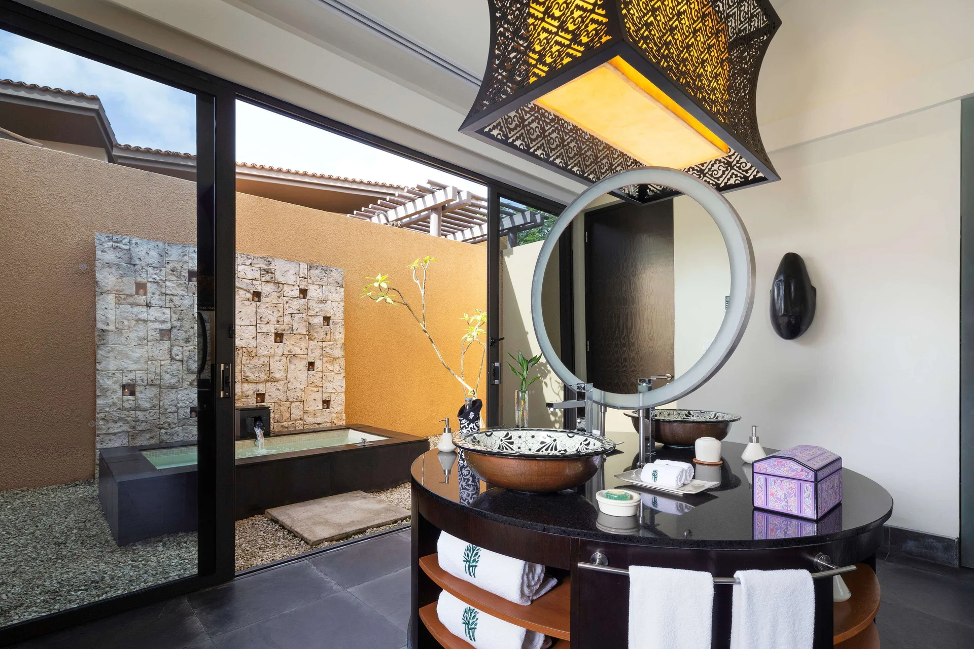 Wellbeing Sanctuary Pool Villa vanity and outdoor bath at Banyan Tree Mayakoba.