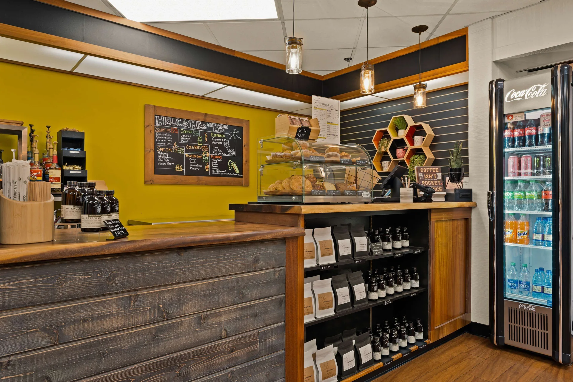 Coffee counter with pastries and cold drinks at Best Western The Plaza Hotel Honolulu Airport.