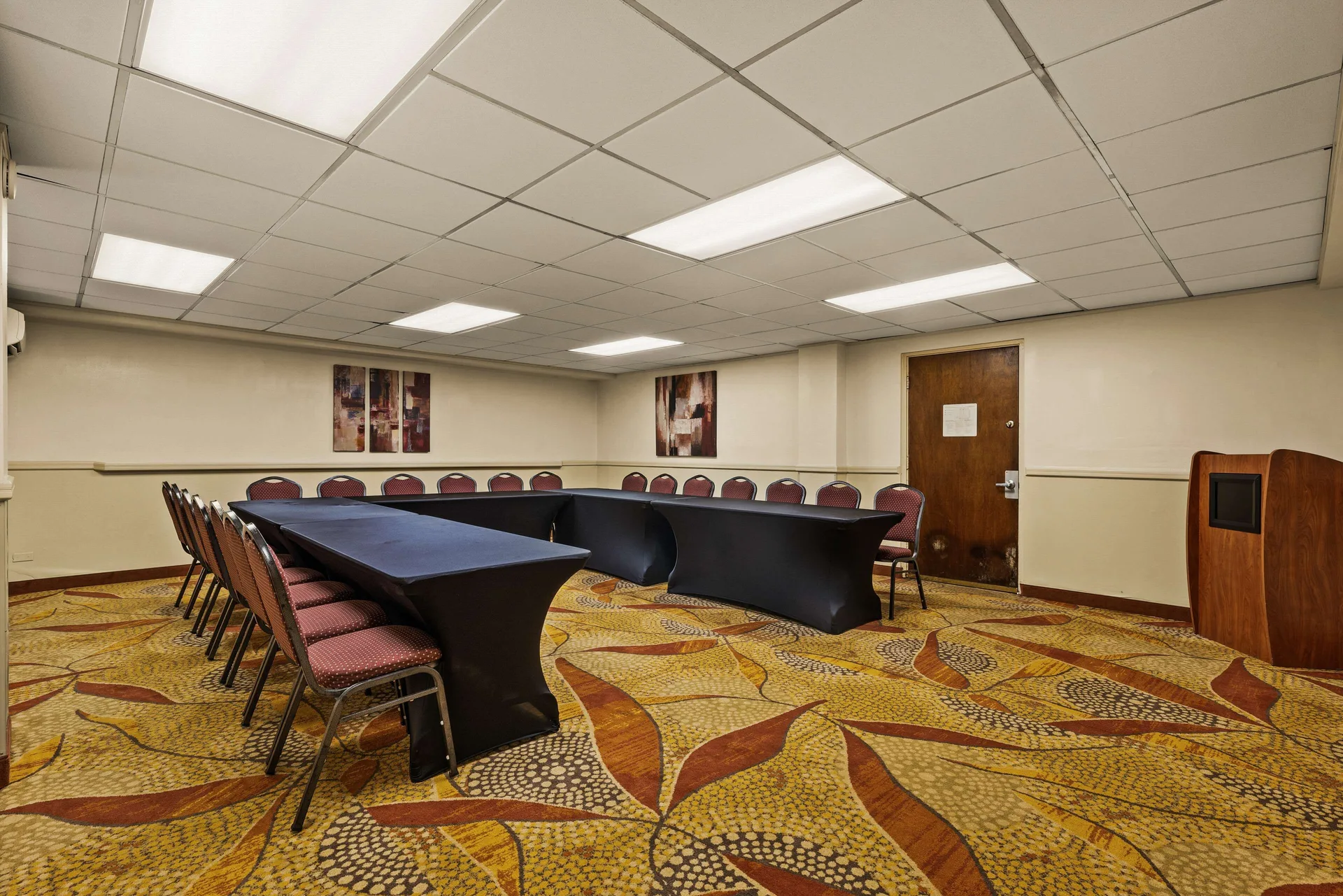Meeting room with U-shaped tables at Best Western The Plaza Hotel Honolulu Airport.