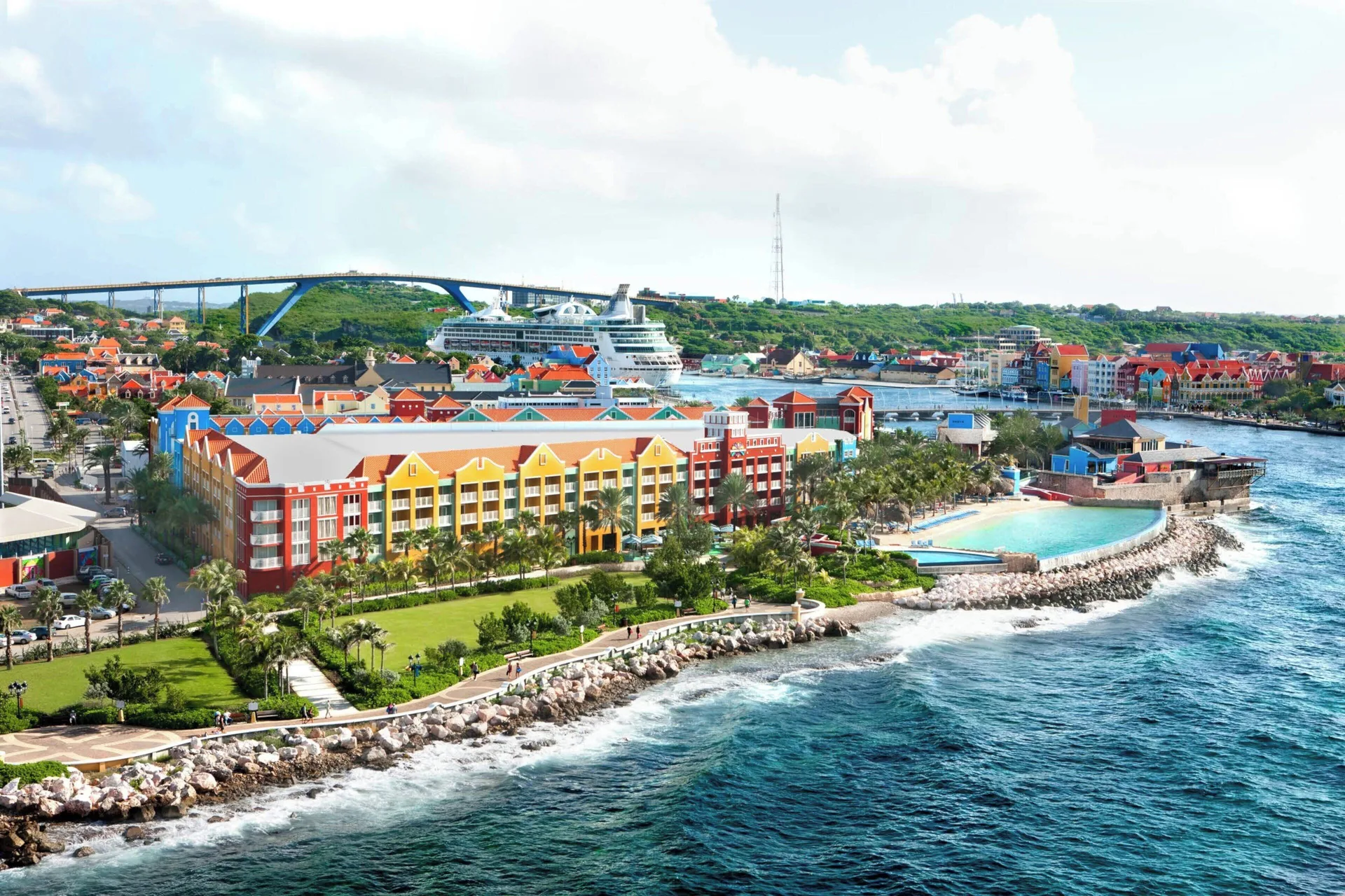 Renaissance Wind Creek Curacao Resort city resort with infinity beach club, casino, and harbor views