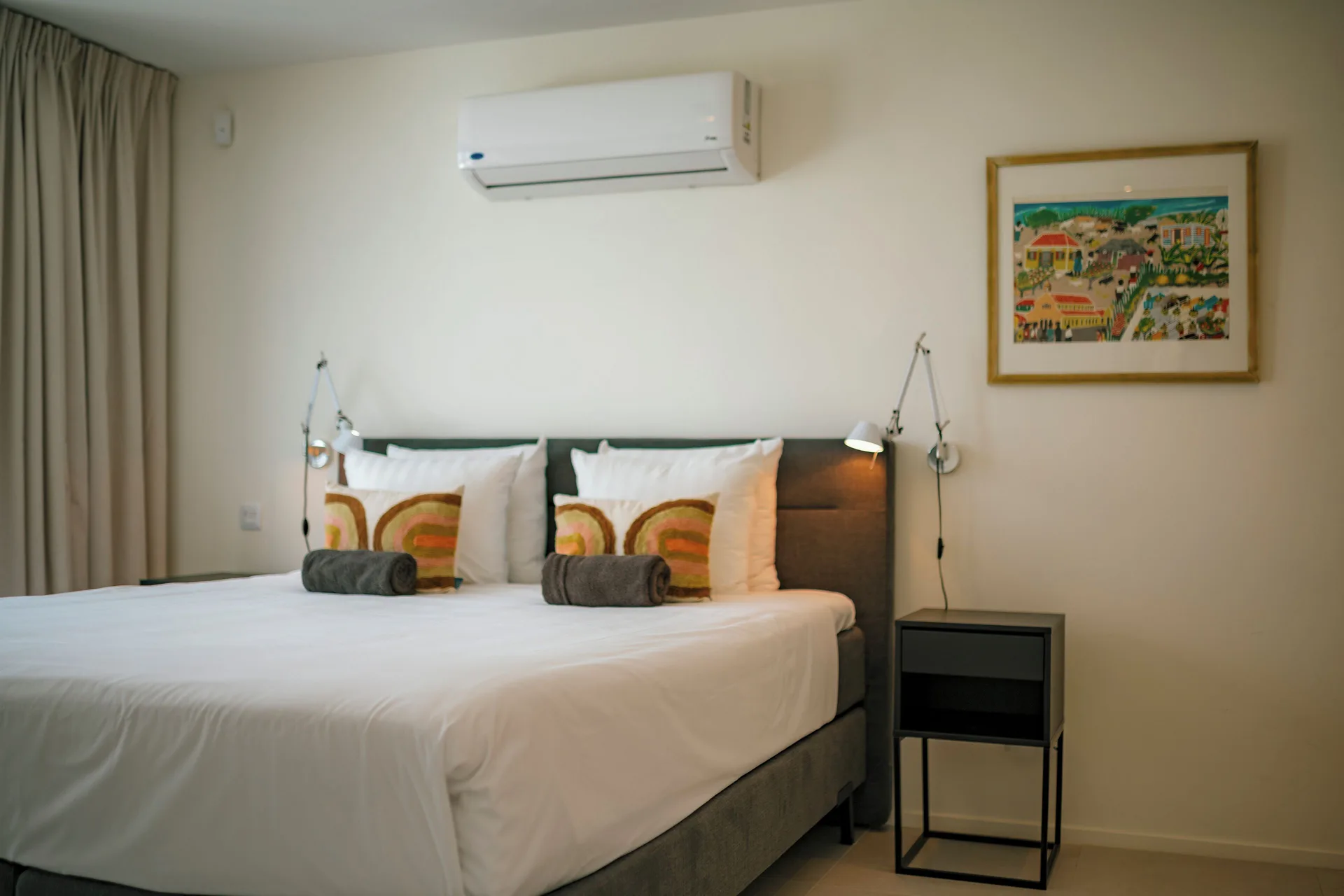 Deluxe Villa bedroom with air conditioning at Blue Bay Curacao Golf & Beach Resort.