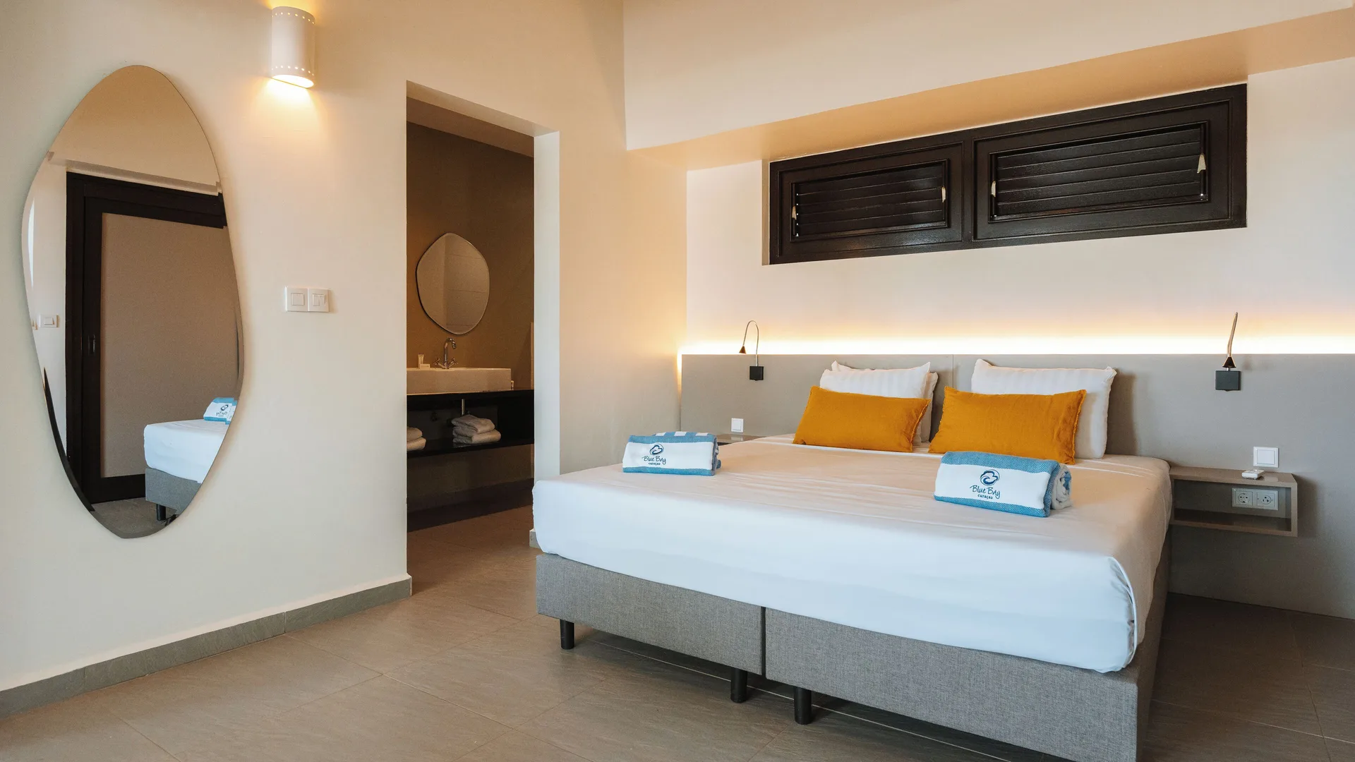 Garden Apartment 2 Bedroom king bed and vanity entrance at Blue Bay Curacao Golf & Beach Resort.