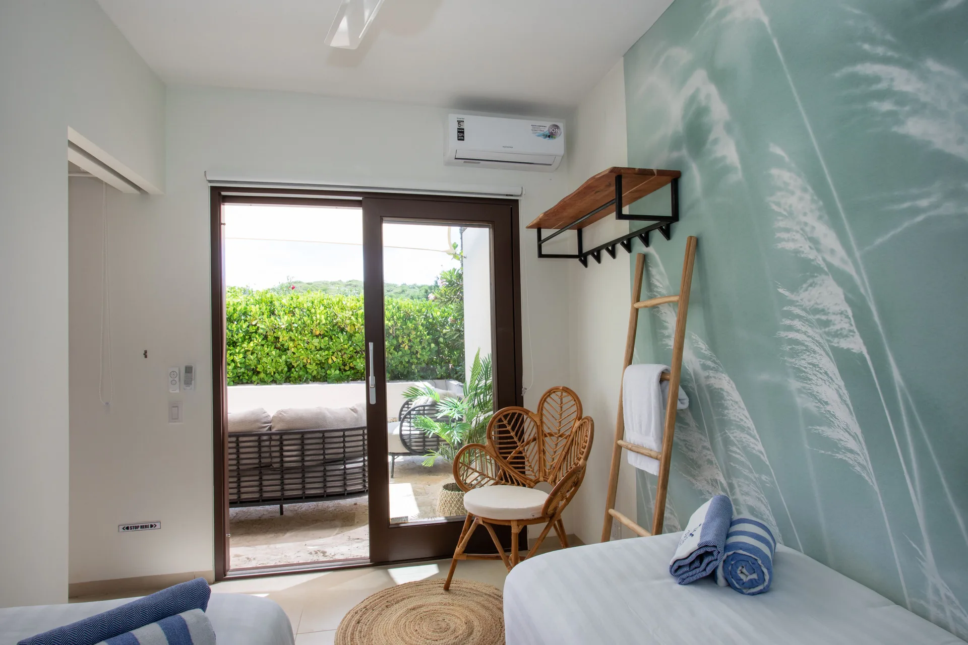 Greenview 2-bedroom Apartment twin beds at Blue Bay Curacao Golf & Beach Resort.