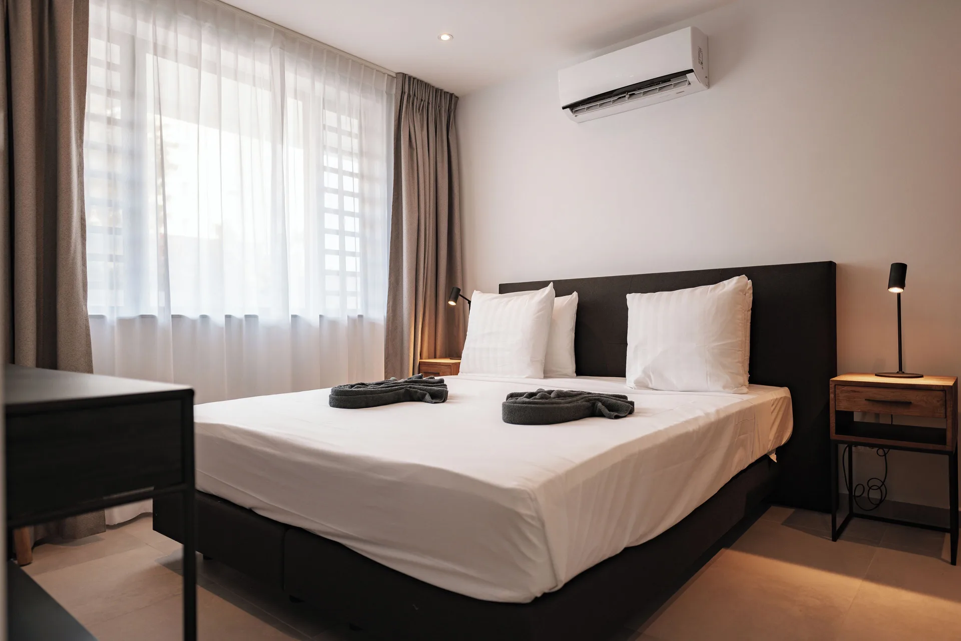 Luxury Apartment bedroom with king bed at Blue Bay Curacao Golf & Beach Resort.