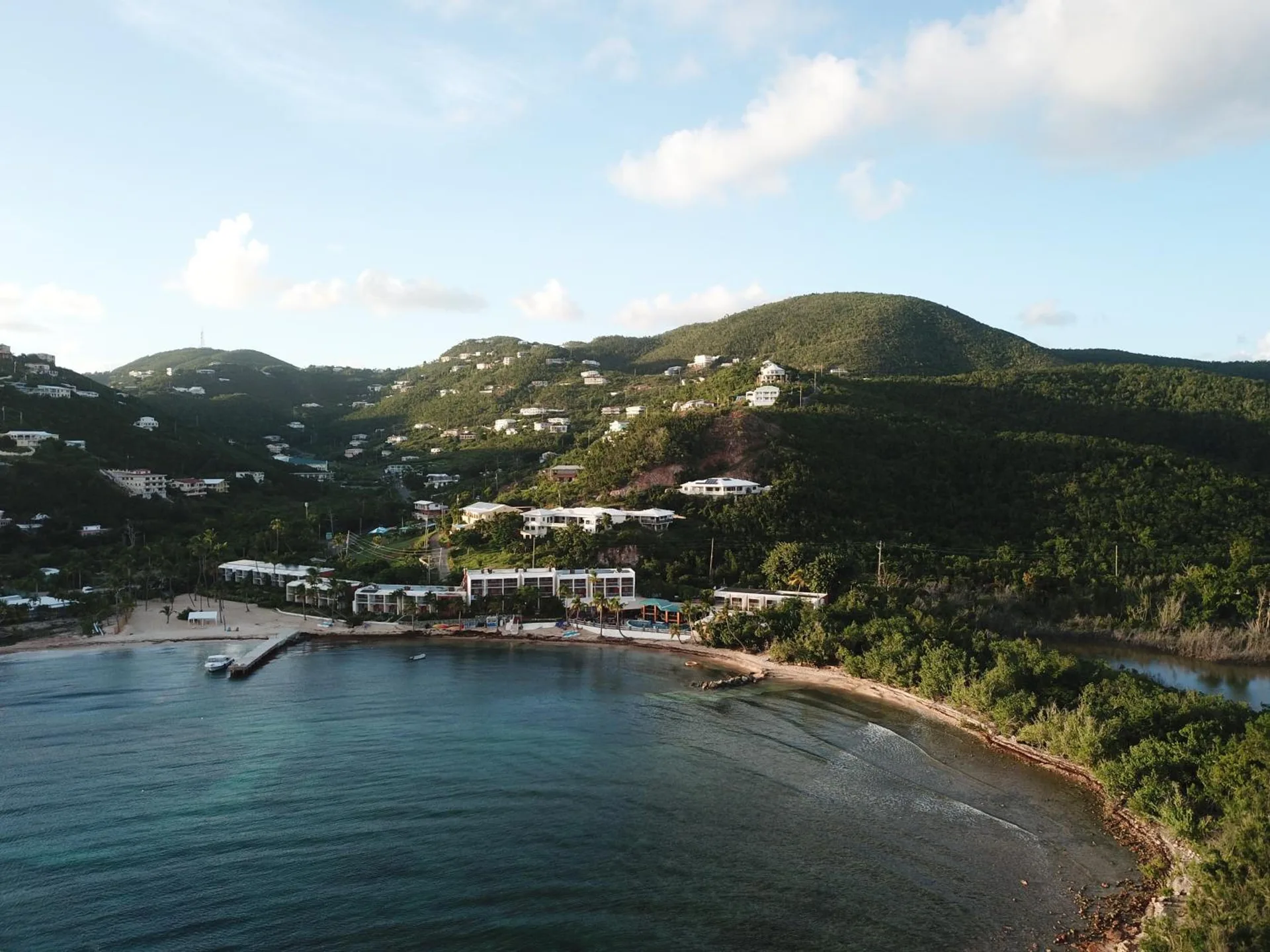 Green hills and bay shoreline above Bolongo Bay Beach Resort.