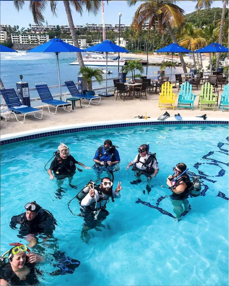 Scuba divers gathered in the pool at Bolongo Bay Beach Resort.
