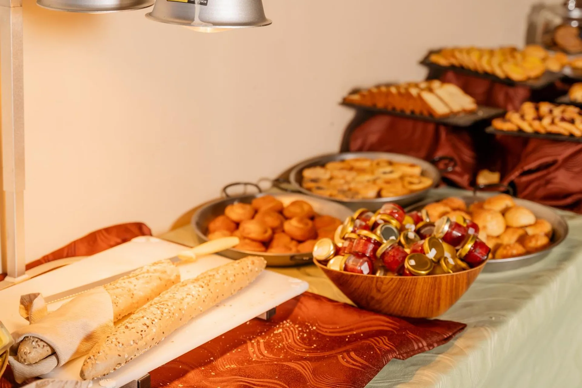 Breakfast buffet pastries, breads, and preserves at Borinquen Thermal Resort.