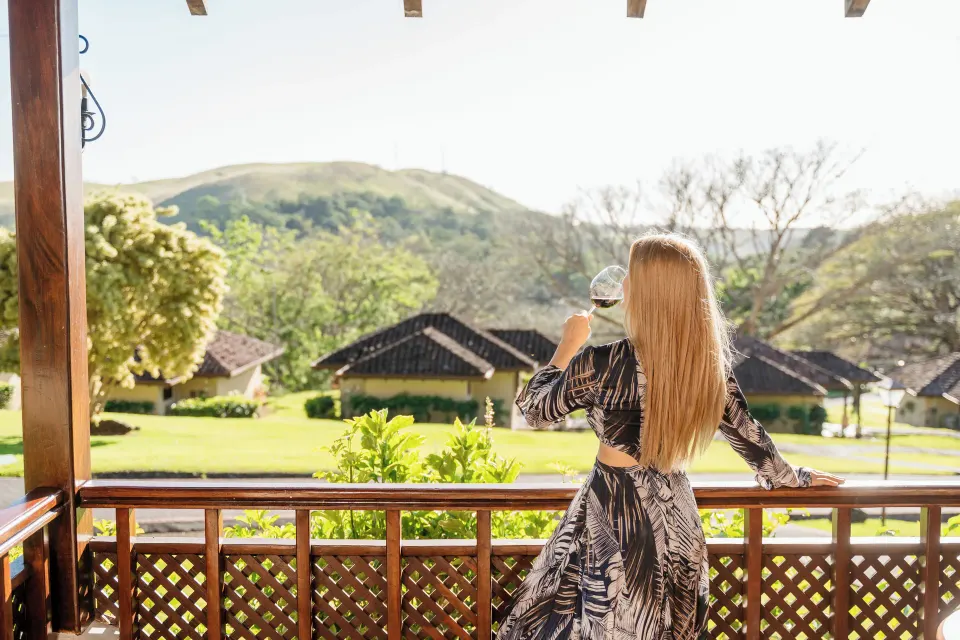 Superior Bungalow balcony with mountain and garden views at Borinquen Thermal Resort.