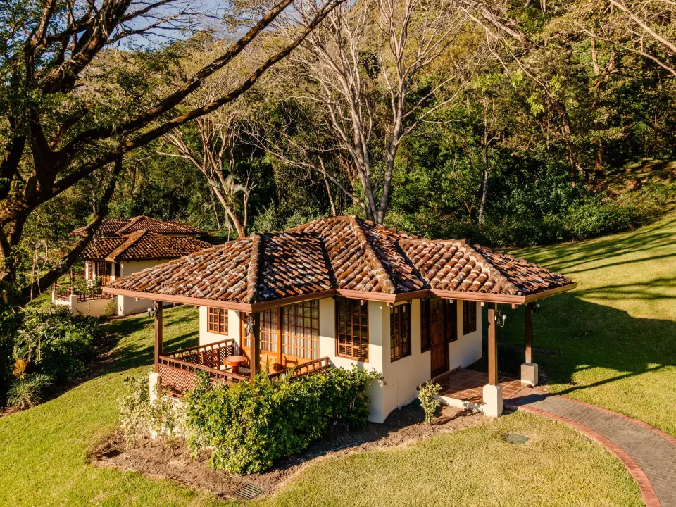 Superior Bungalow exterior on landscaped grounds at Borinquen Thermal Resort.