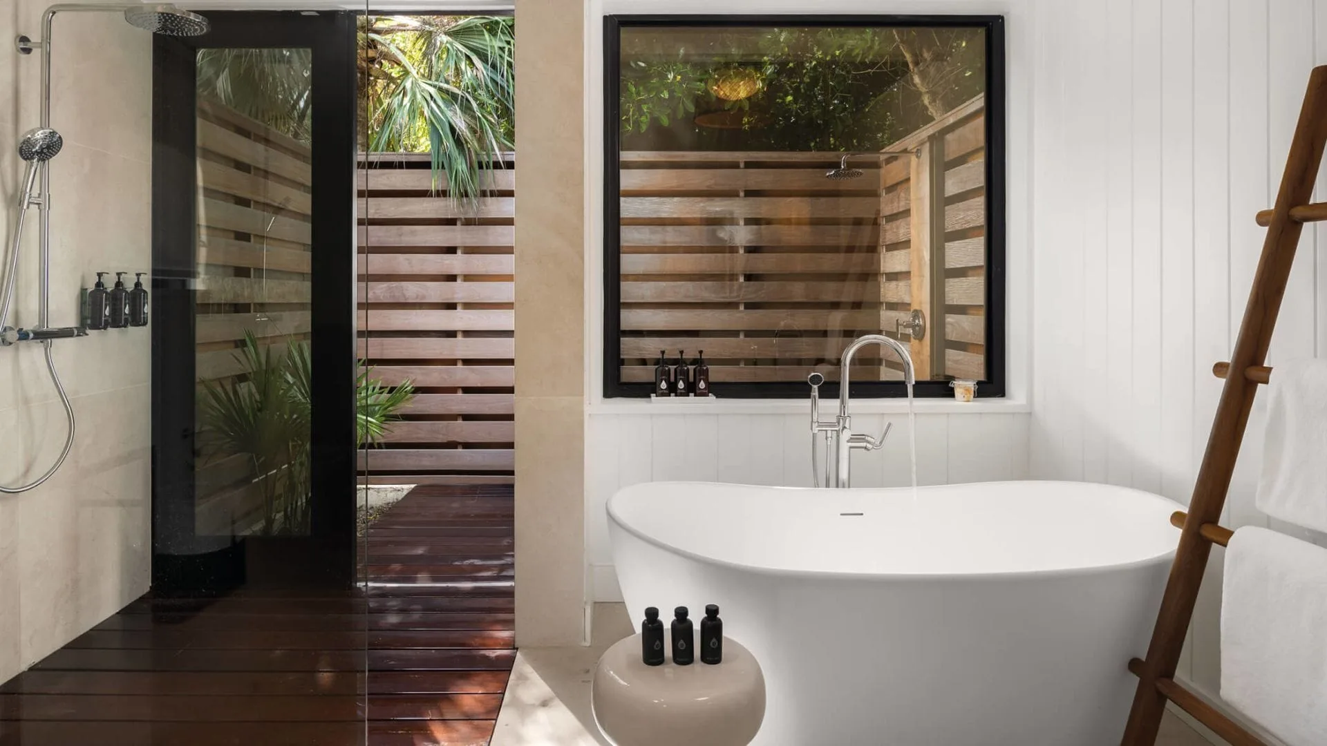 Como Villa bathroom with freestanding tub and outdoor shower at COMO Parrot Cay.
