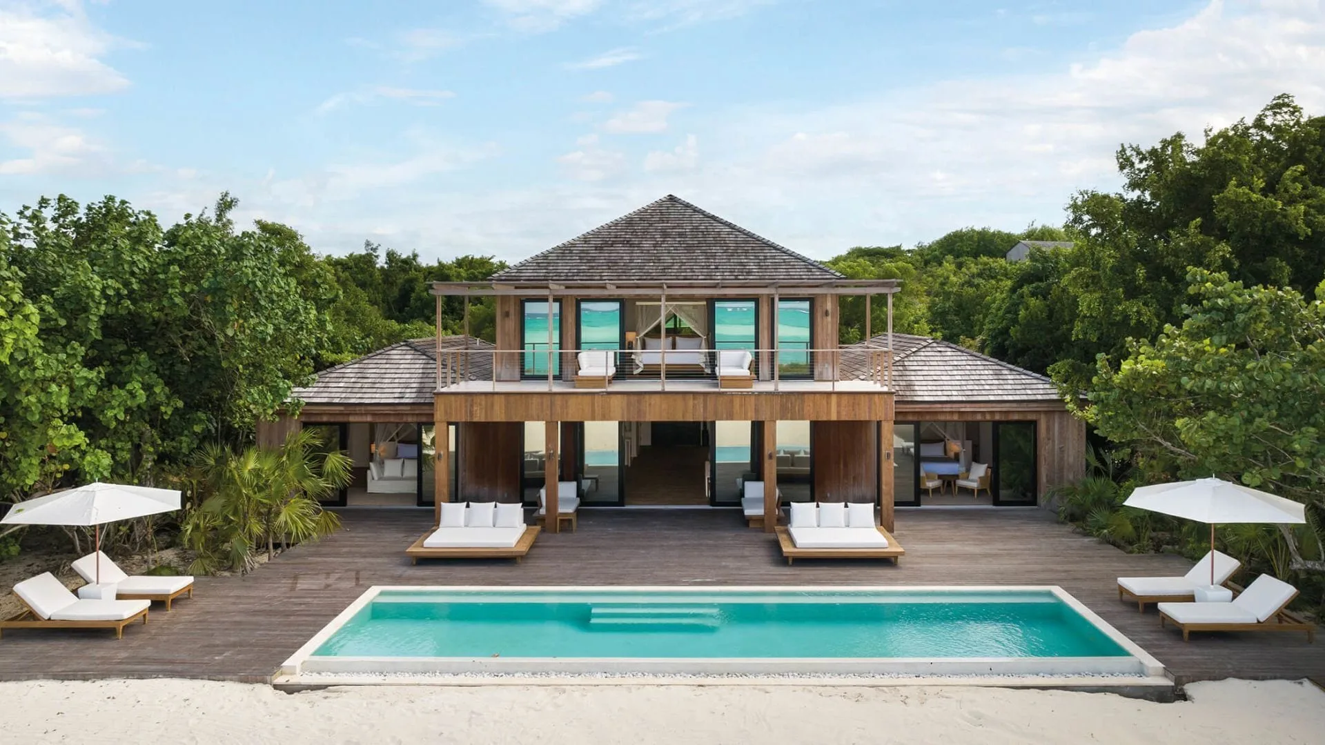 Beachfront Como Villa with private pool and loungers at COMO Parrot Cay.
