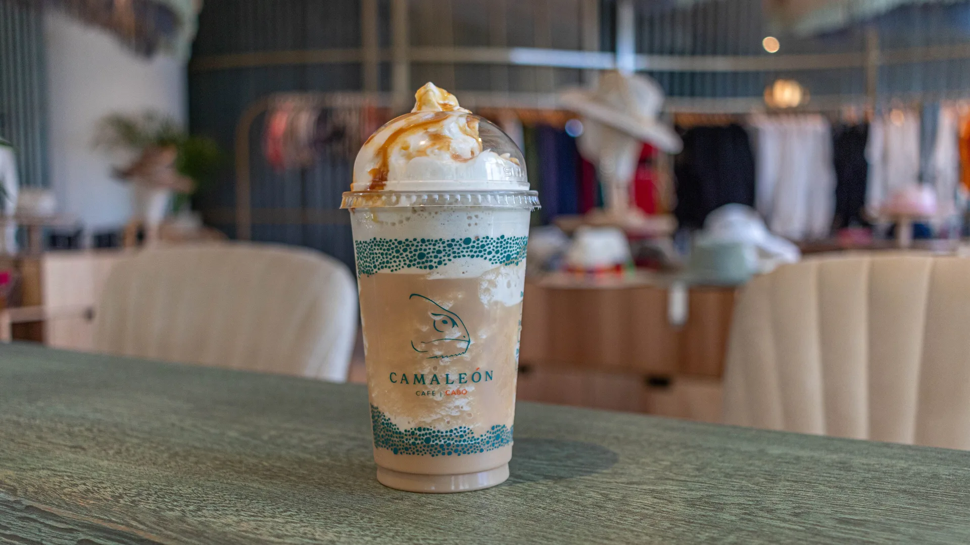 Iced blended coffee drink on a café table at Corazón Cabo.