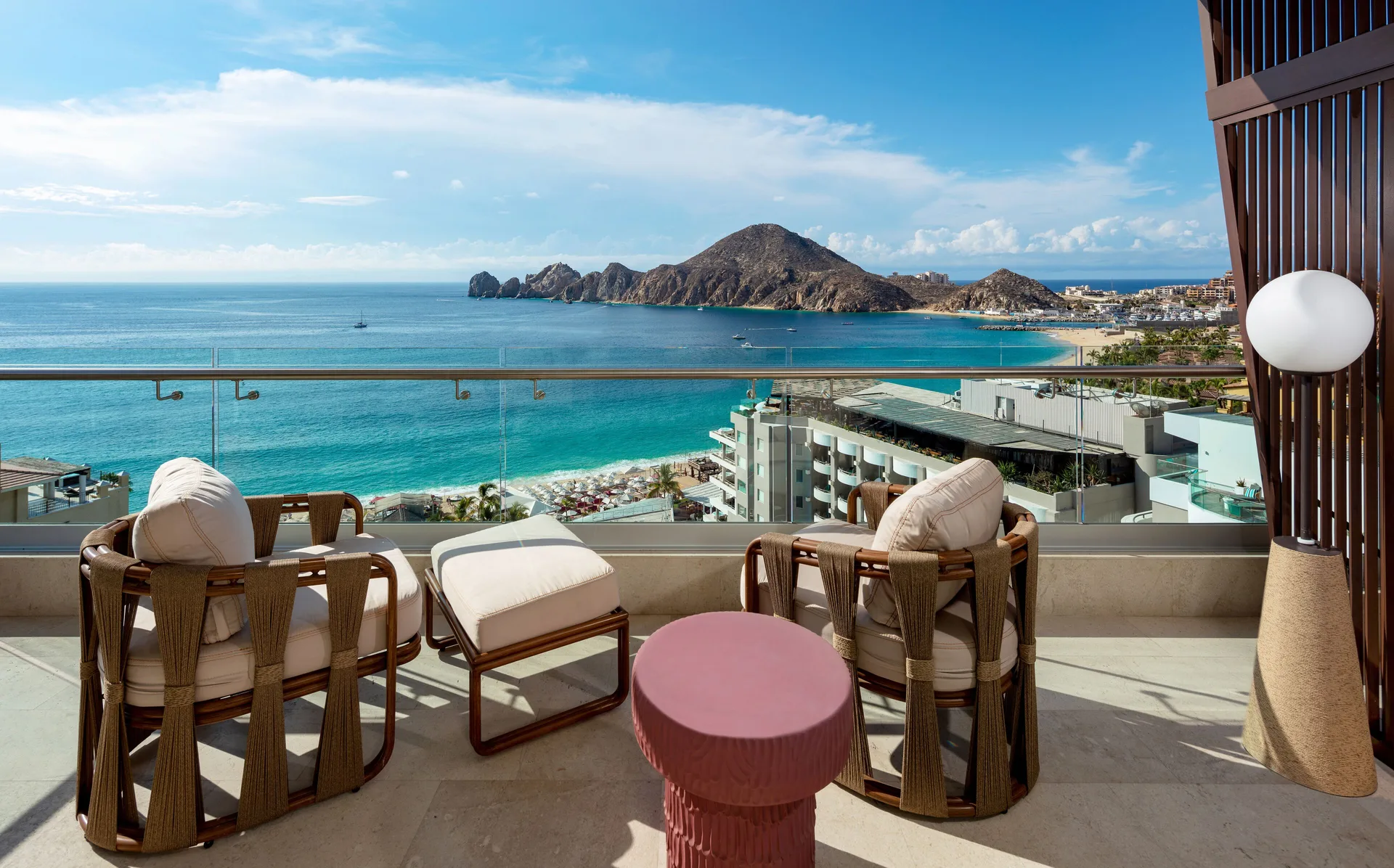 Infinity Ocean View room balcony with ocean and Land’s End scenery at Corazón Cabo.